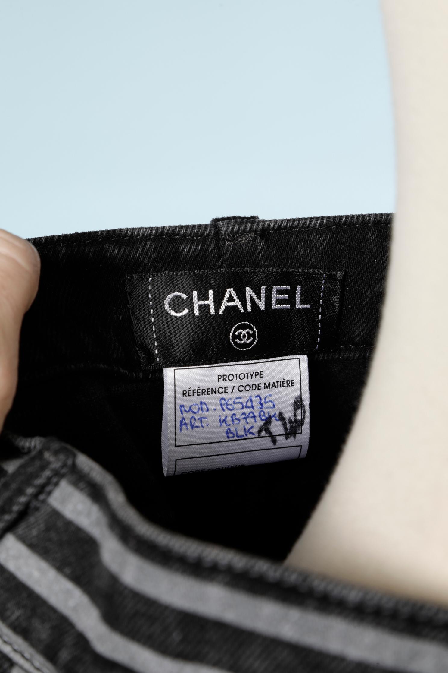 Striped denim pants with branded buttons Chanel  1