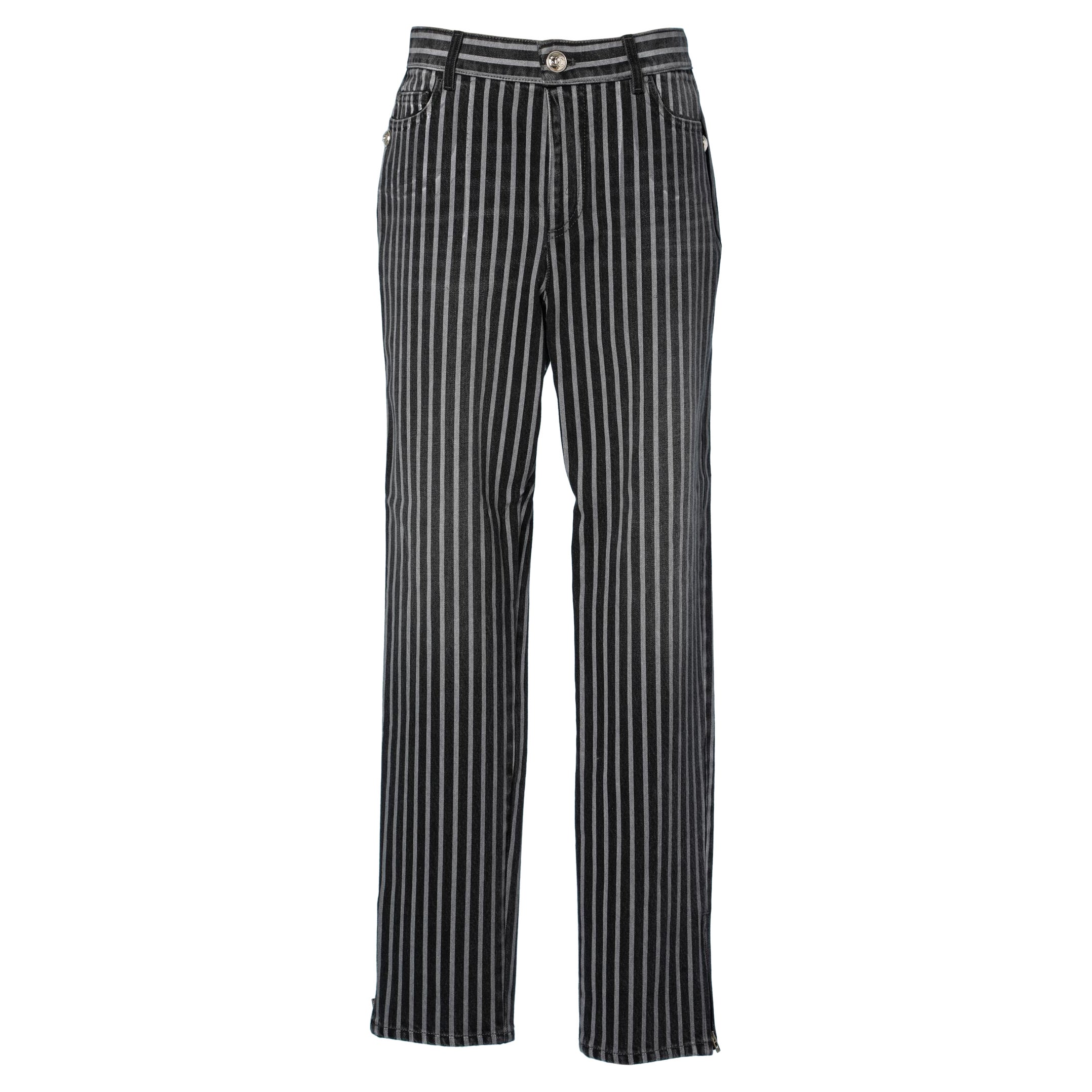 Striped denim pants with branded buttons Chanel