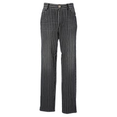 Striped denim pants with branded buttons Chanel