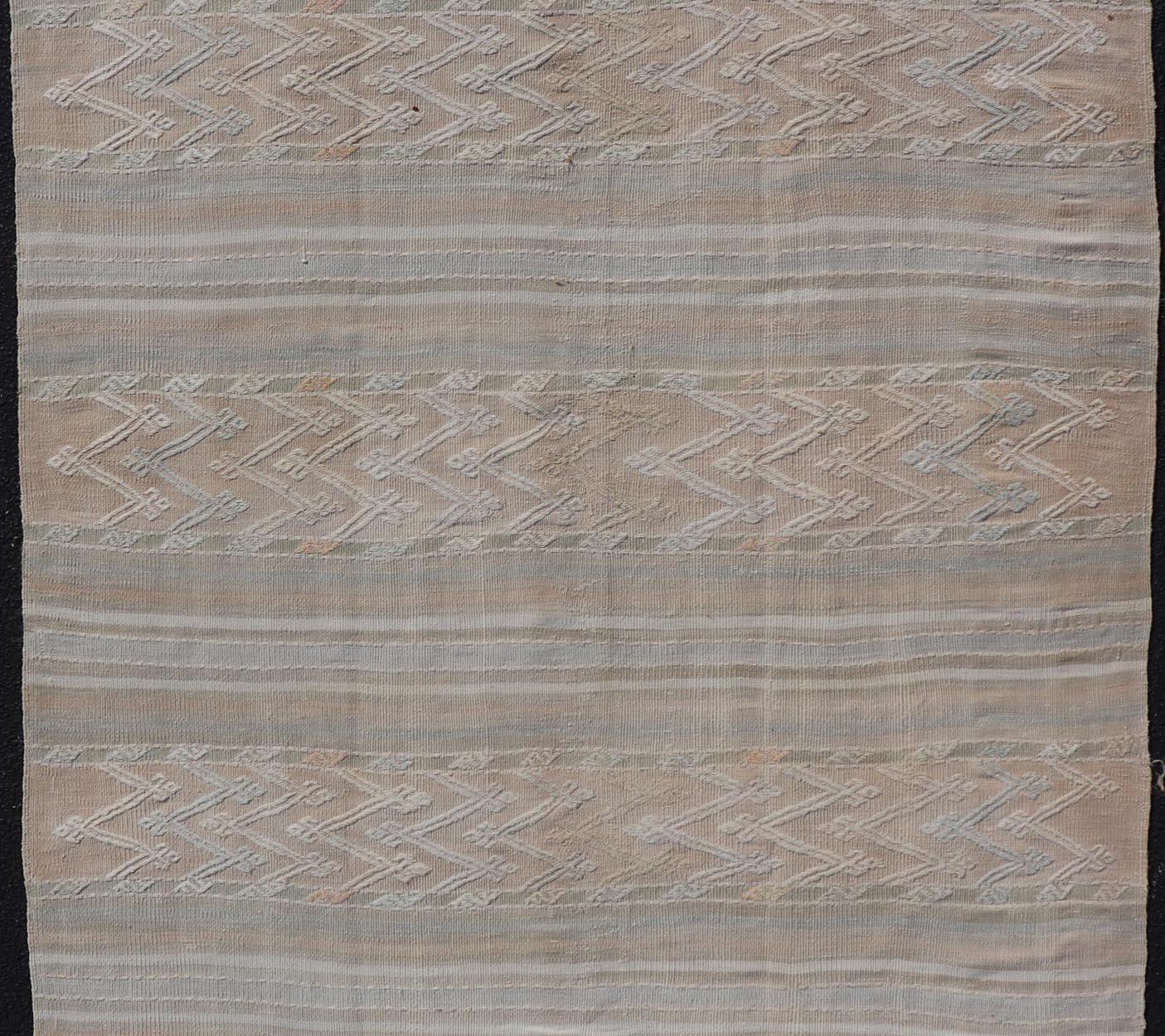 Hand-Woven Striped Hand Woven Turkish Flat-Weave Kilim in Muted Colors and Tribal Motifs For Sale