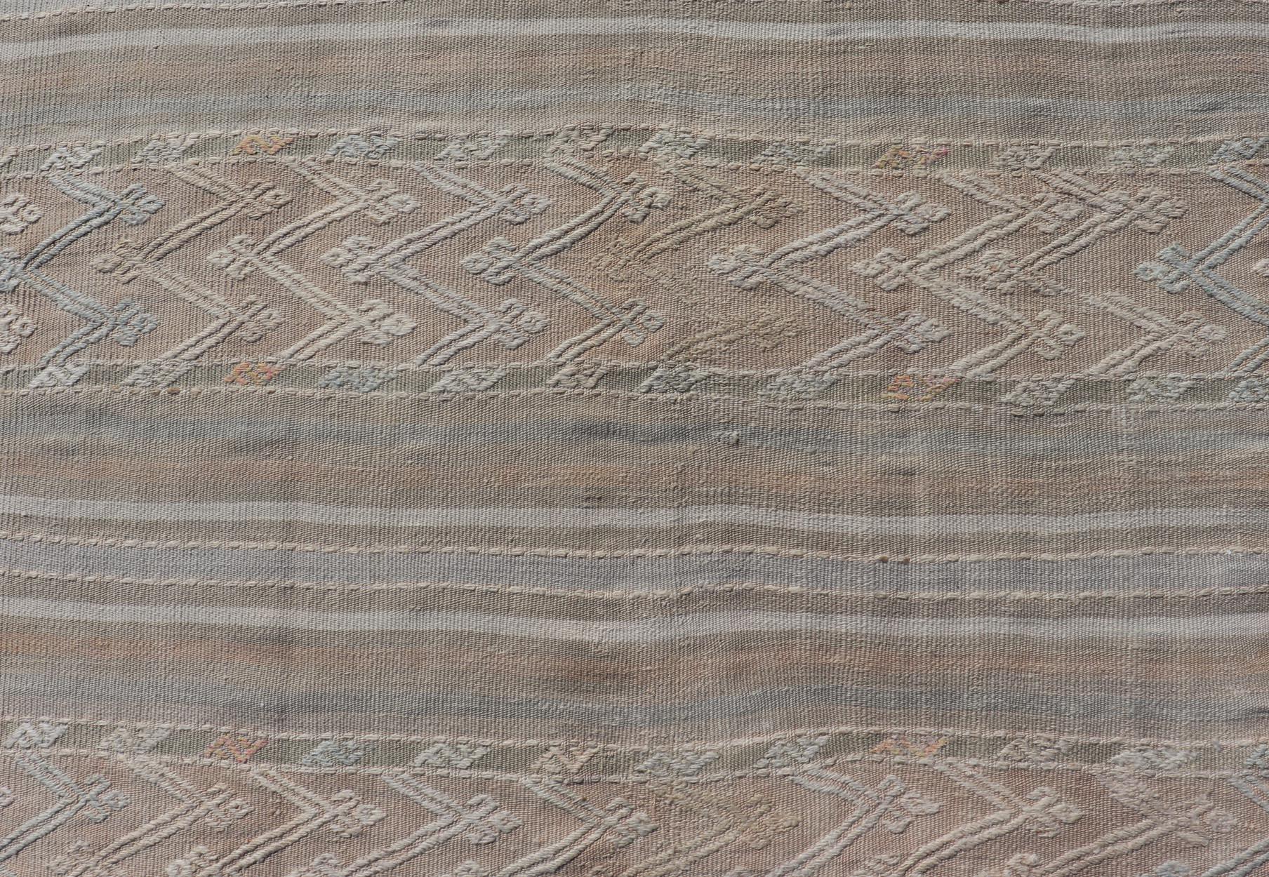 Striped Hand Woven Turkish Flat-Weave Kilim in Muted Colors and Tribal Motifs For Sale 1