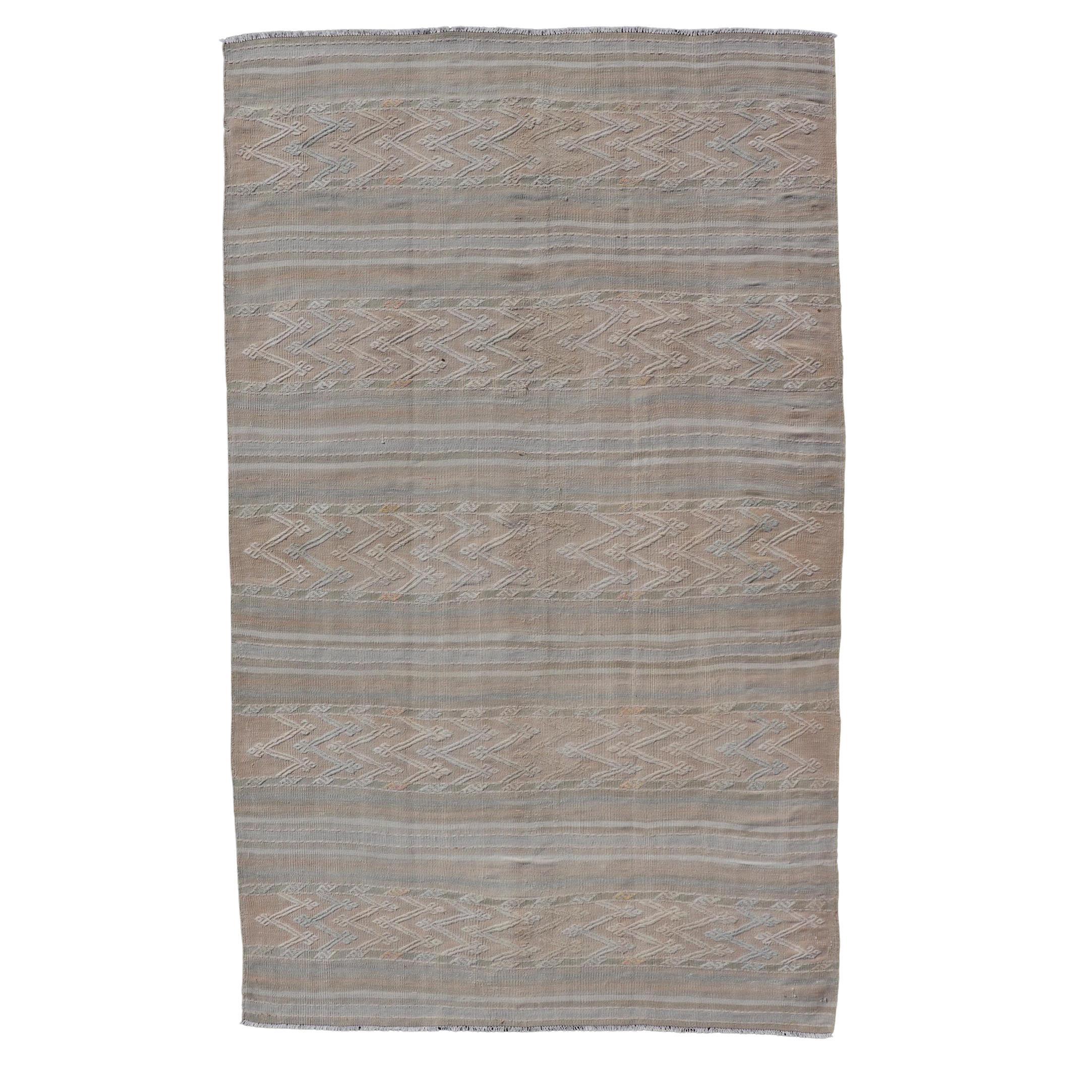 Striped Hand Woven Turkish Flat-Weave Kilim in Muted Colors and Tribal Motifs For Sale