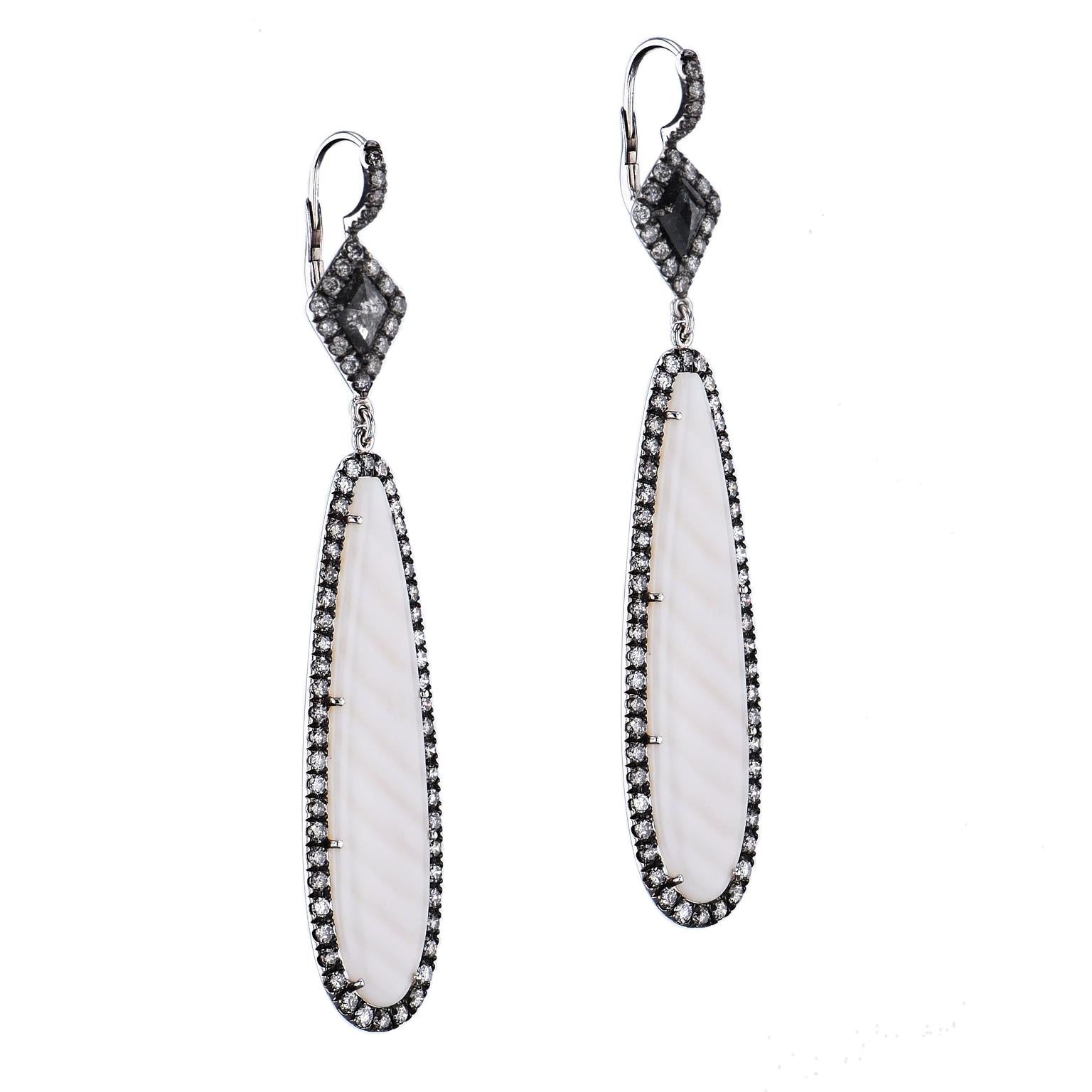 Striped Madagascar Chalcedony Drop Earrings Natural Black Diamond with Pave 

These elegant earrings are one of a kind and handmade by HHJewels.  They are created in 18 karat white gold with striped Chalcedony drops from Madagascar.  Adorning the