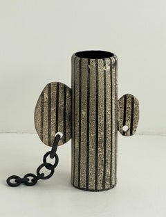 Striped Punk by Kalou Dubus, Raw White Stoneware, Black Volcanic Glaze, Piercing