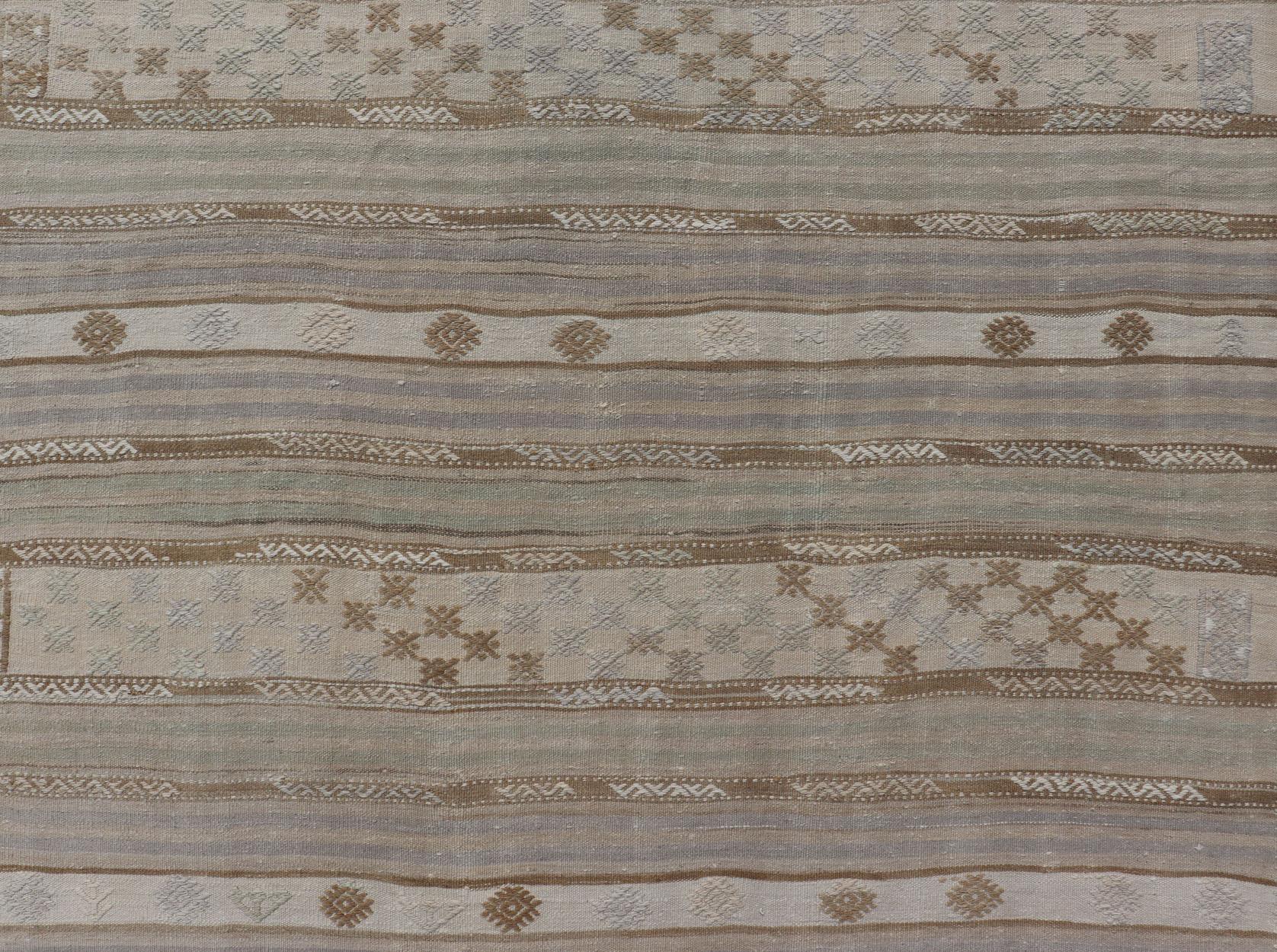 Striped Turkish Flat-Weave Kilim in Muted Colors and Tribal Motifs For Sale 4
