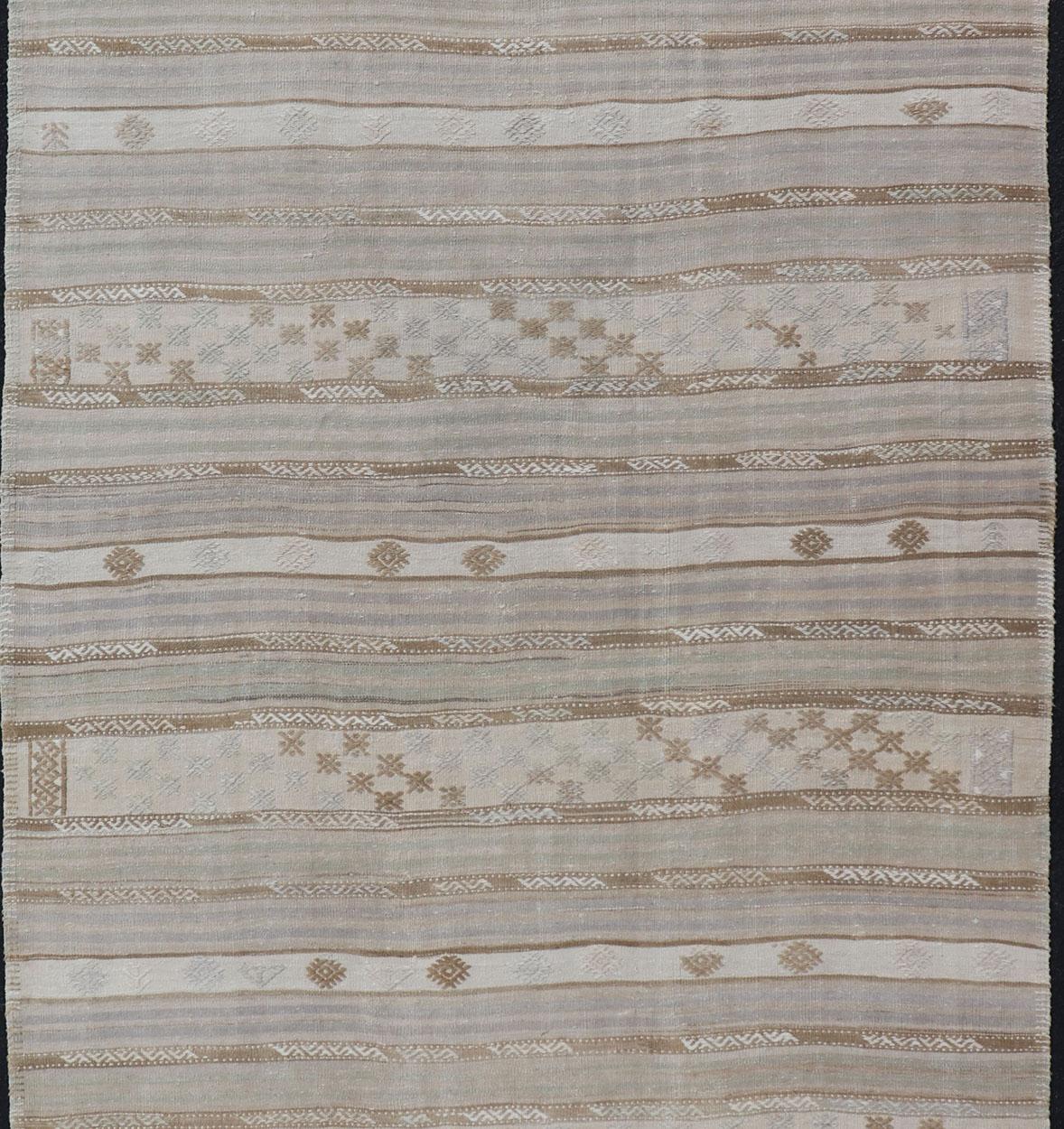 Hand-Knotted Striped Turkish Flat-Weave Kilim in Muted Colors and Tribal Motifs For Sale