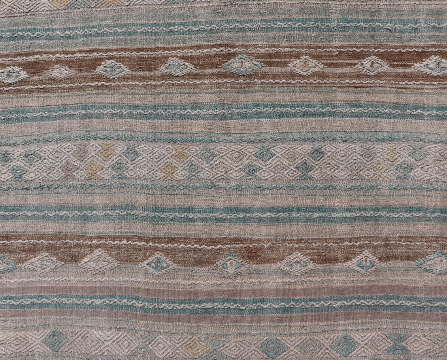 Wool Striped Turkish Hand Woven Flat-Weave Kilim in Muted Colors and Tribal Motifs For Sale