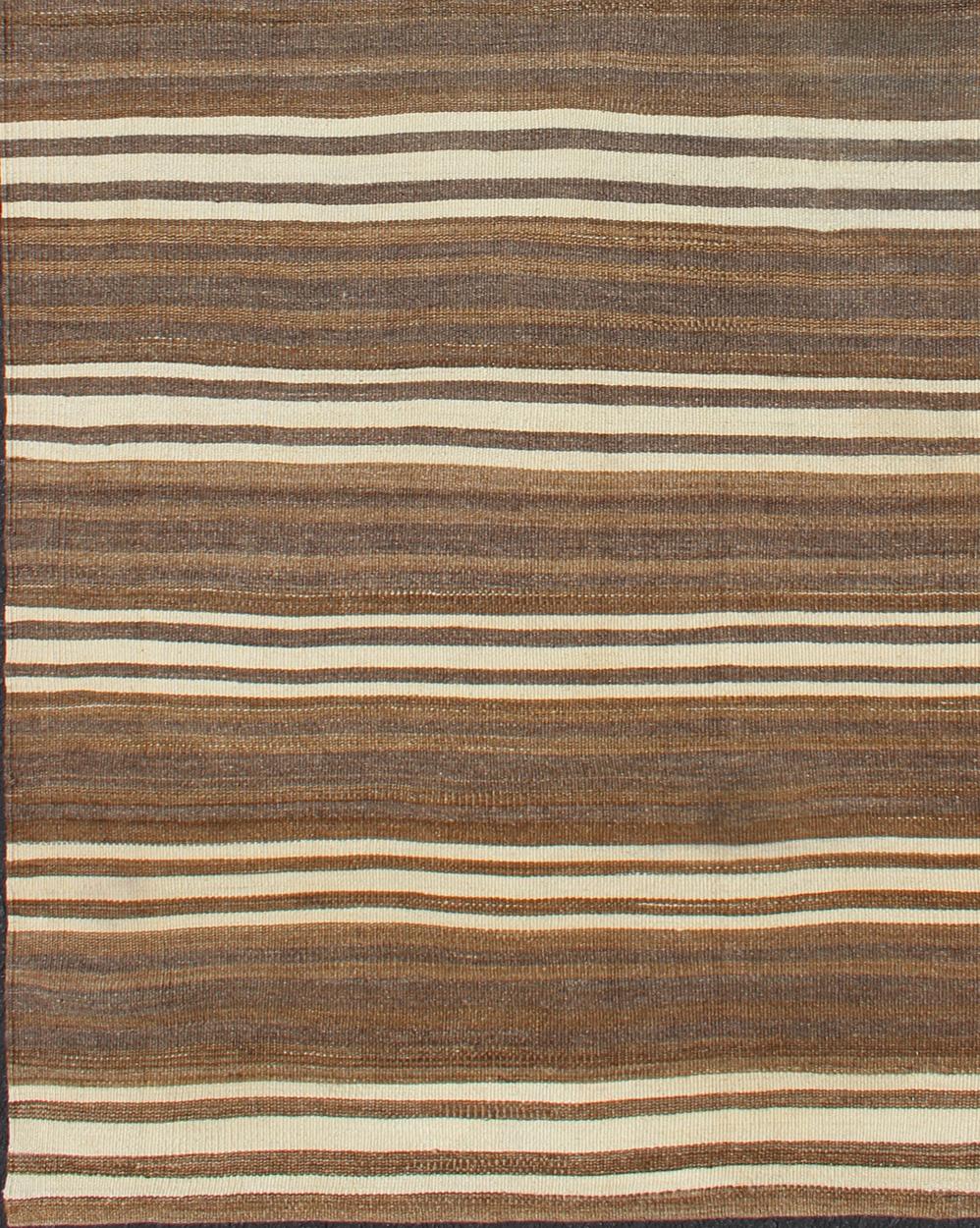 Ivory and brown vintage Kilim from Turkey with Minimalist stripes, rug en-165992, country of origin / type: Turkey / Kilim, circa 1950

This vintage striped design Kilim from Turkey rendered in shade of brown's, taupe's and ivory tones.
Measures: