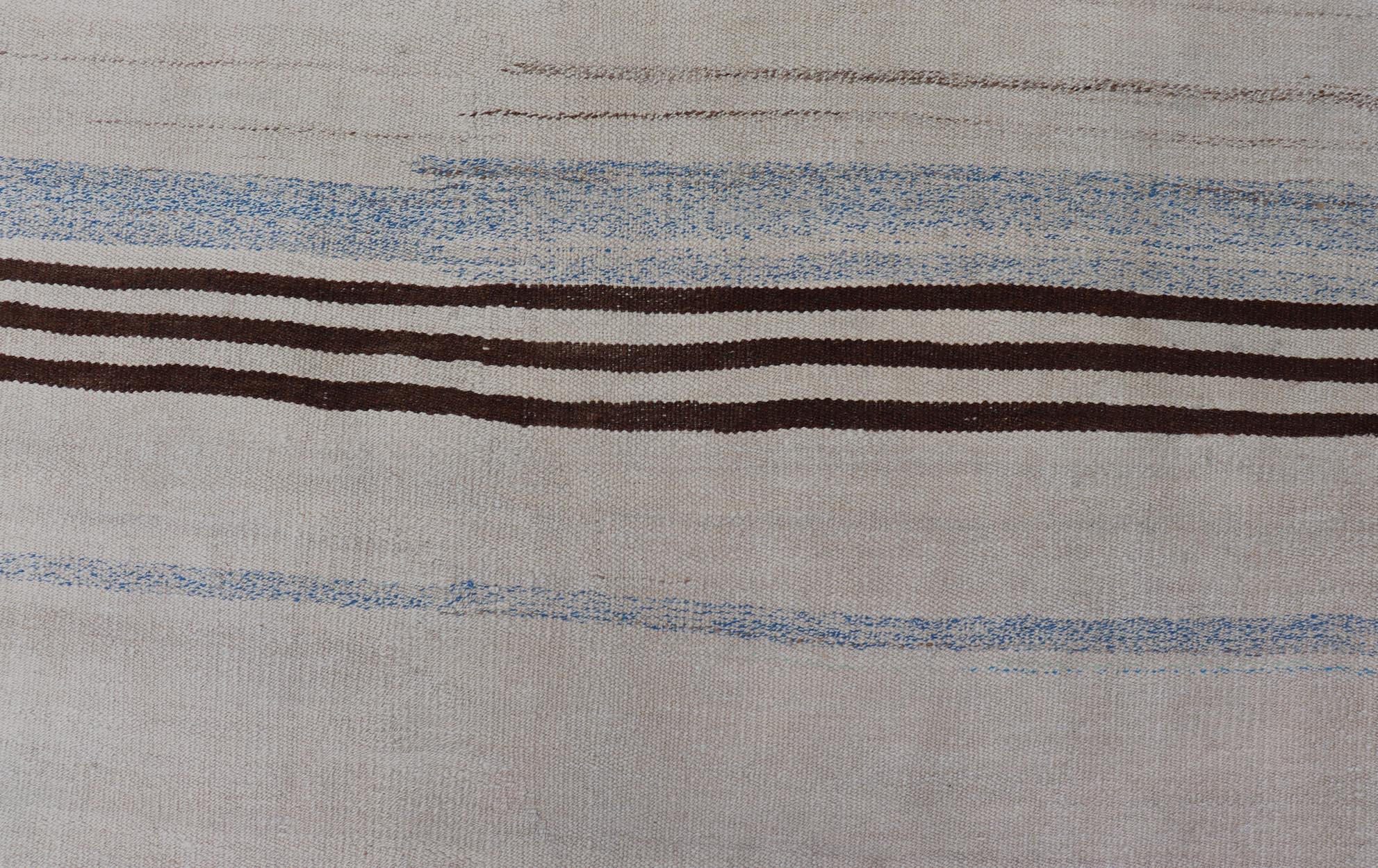 Striped Turkish Vintage Kilim Flat-Weave Rug in Brown's and Ivory. Keivan Woven Arts / rug EN-15167, country of origin / type: Turkey / Kilim, circa 1950
Measures: 5'0 x 7'0 
This vintage striped design Kilim from Turkey rendered in shade of brown's