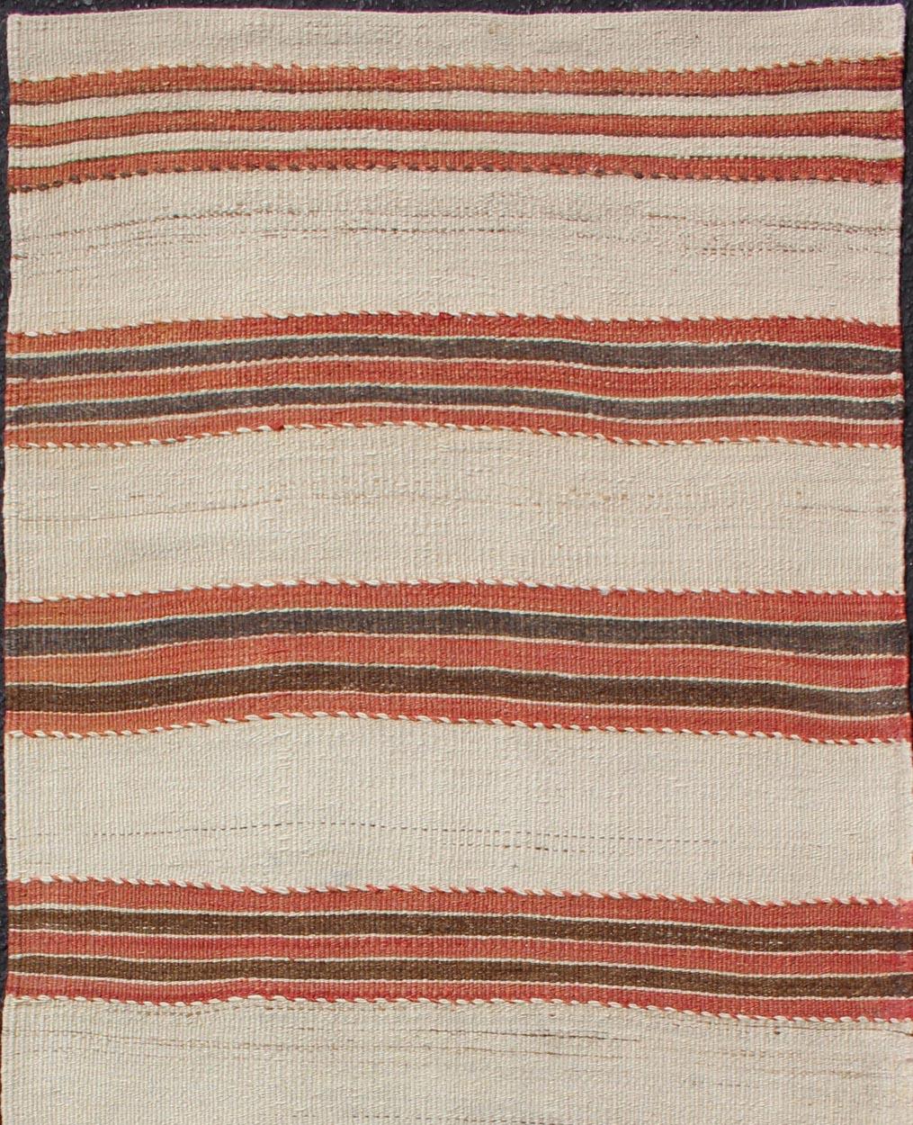Red, Ivory and brown vintage Kilim from Turkey with Minimalist design in stripes, rug EN-179677, country of origin / type: Turkey / Kilim, circa 1950

This vintage striped design Kilim from Turkey rendered in shade of brown's, taupe's, red, and