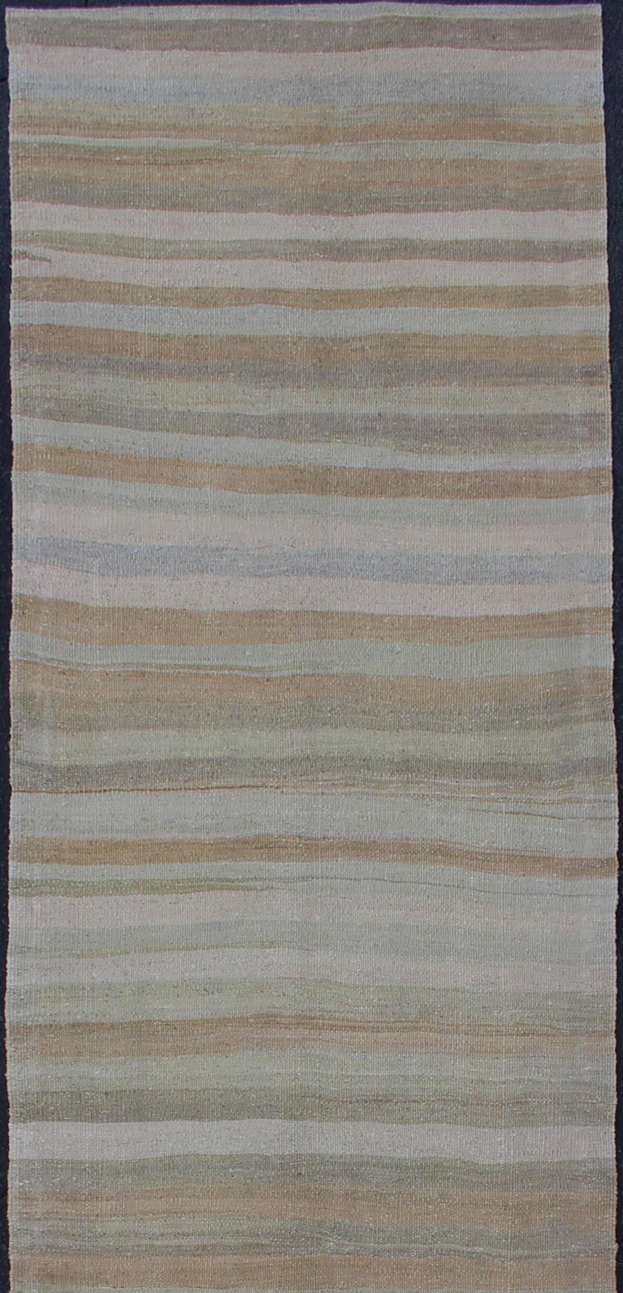 Vintage Kilim runner from Turkey with stripes, rug / EN-176326, country of origin / type: Turkey / Kilim, circa 1960

Measures: 2'5 x 10'8 

This softly striped-design vintage runner from Turkey features a modern look, rendered in taupe, gray,
