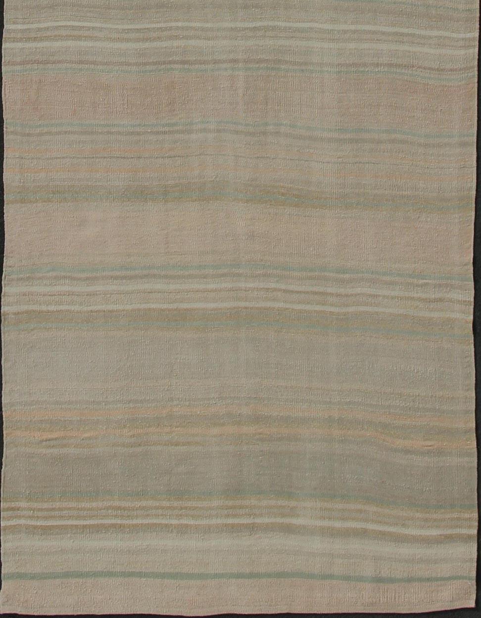 Gallery long runner Turkish vintage Kilim with horizontal stripe design, Keivan Woven Arts rug/EN-176580, country of origin / type: Iran / Kilim, circa 1950.

Measures: 4'10 x 15'10

Featuring a subtle stripe design, this unique 1950s Kilim Gallery