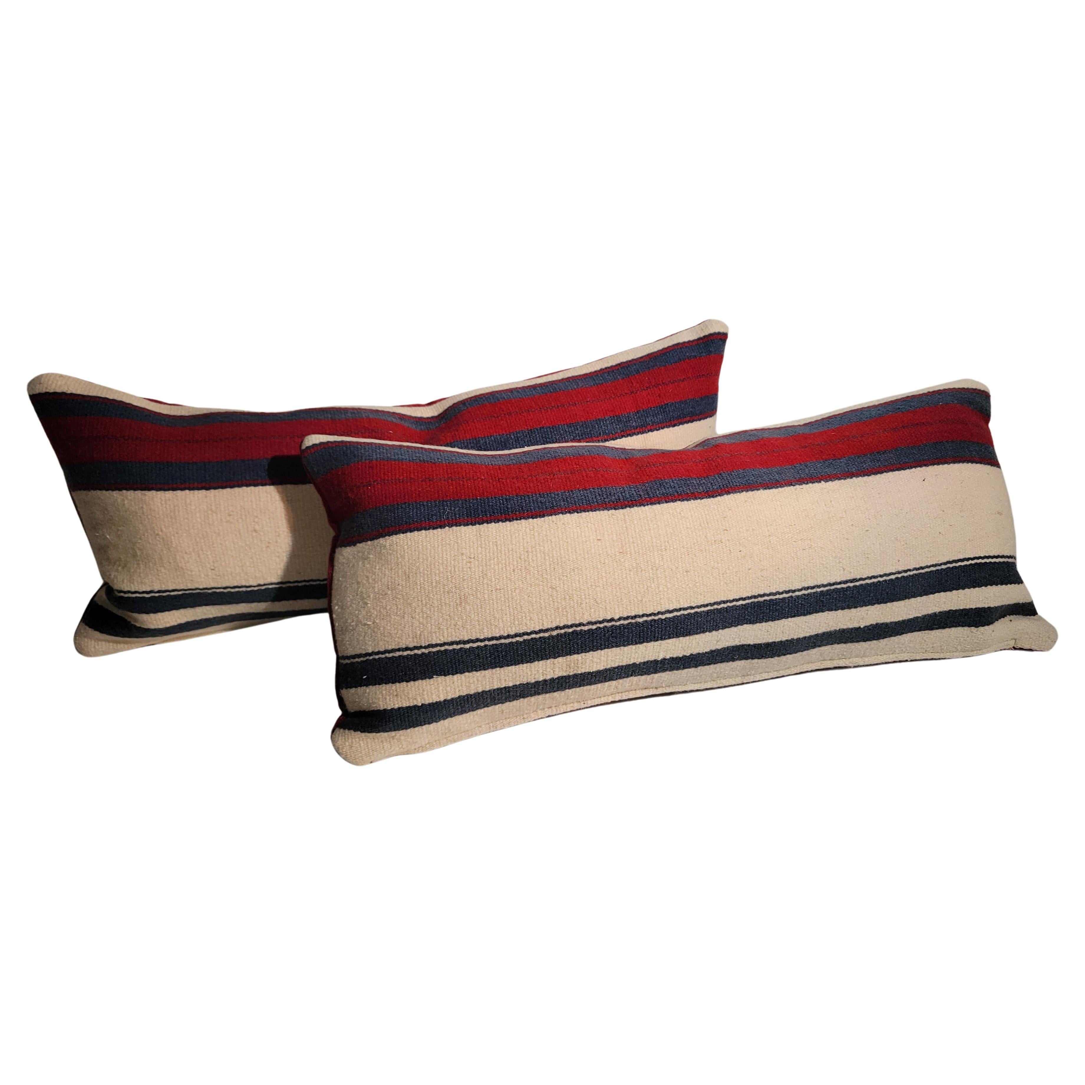 Oreillers allongés en laine rayée tissage mexicain
