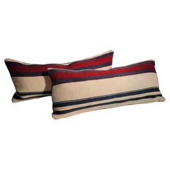 Oreillers allongés en laine rayée tissage mexicain
