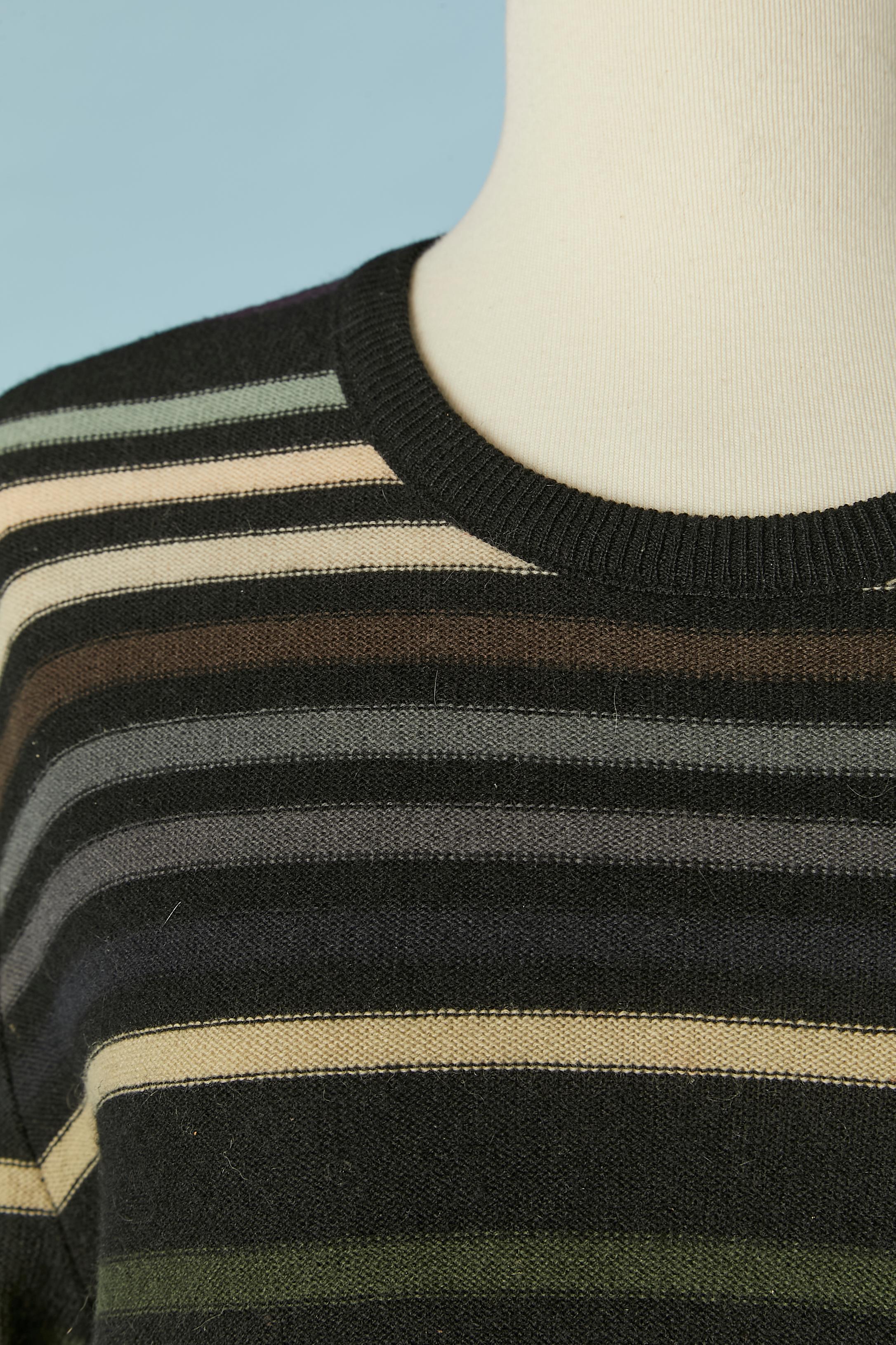 Striped wool sweater. 
SIZE M 