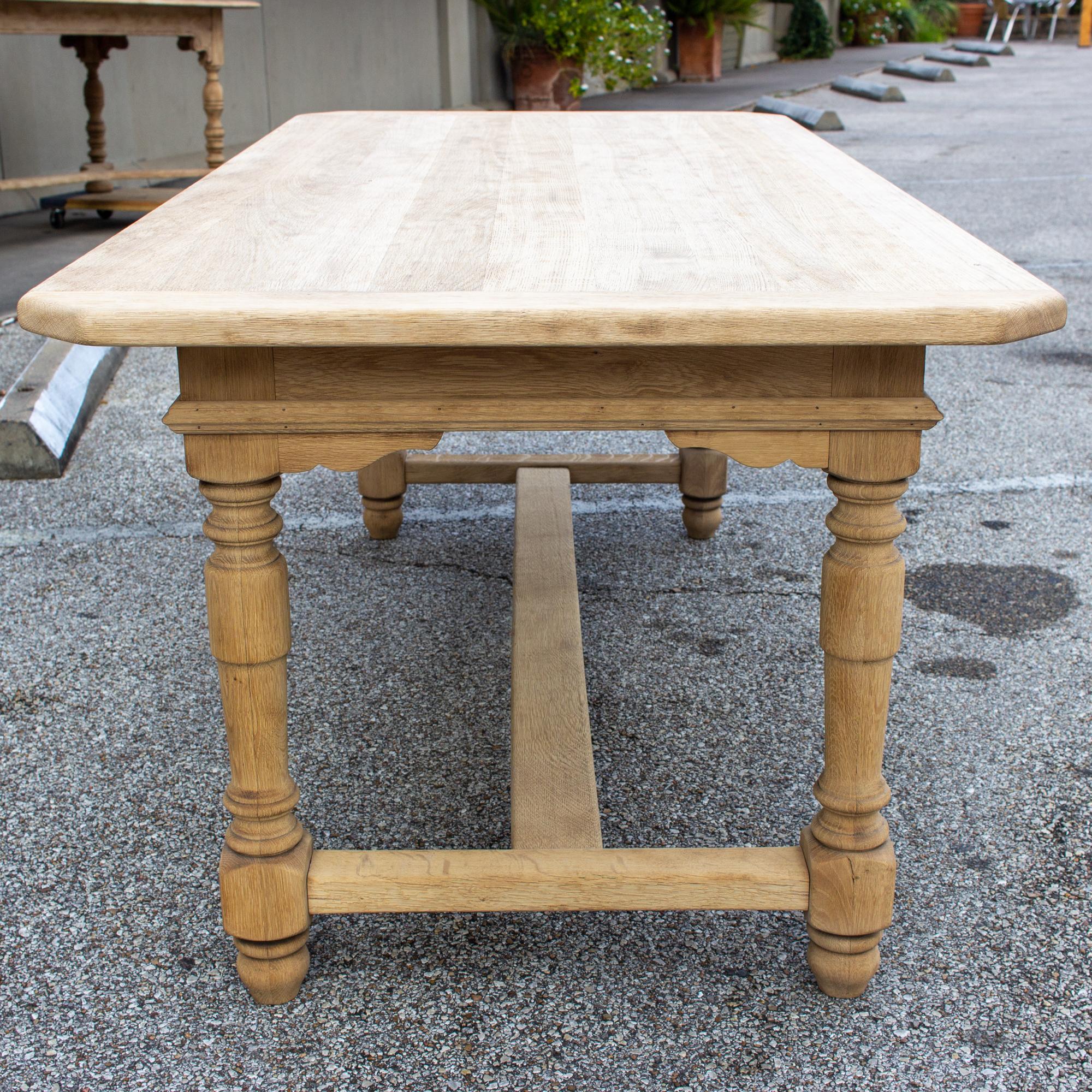Stripped Antique French Oak Table with Hand Carved Details In Good Condition In Houston, TX