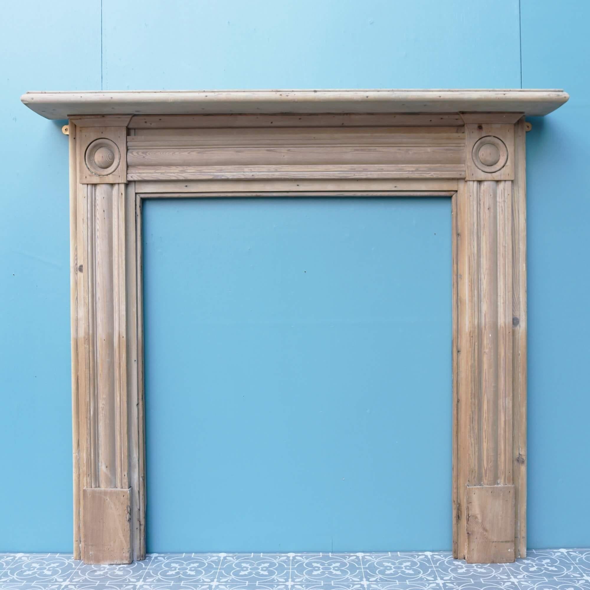 This pine bullseye fireplace is more than 200 years old. Though the design is simple, the Georgian style surround speaks volumes in an interior, ornamented with round ‘bullseye’ details on each end block alongside a moulded frieze and