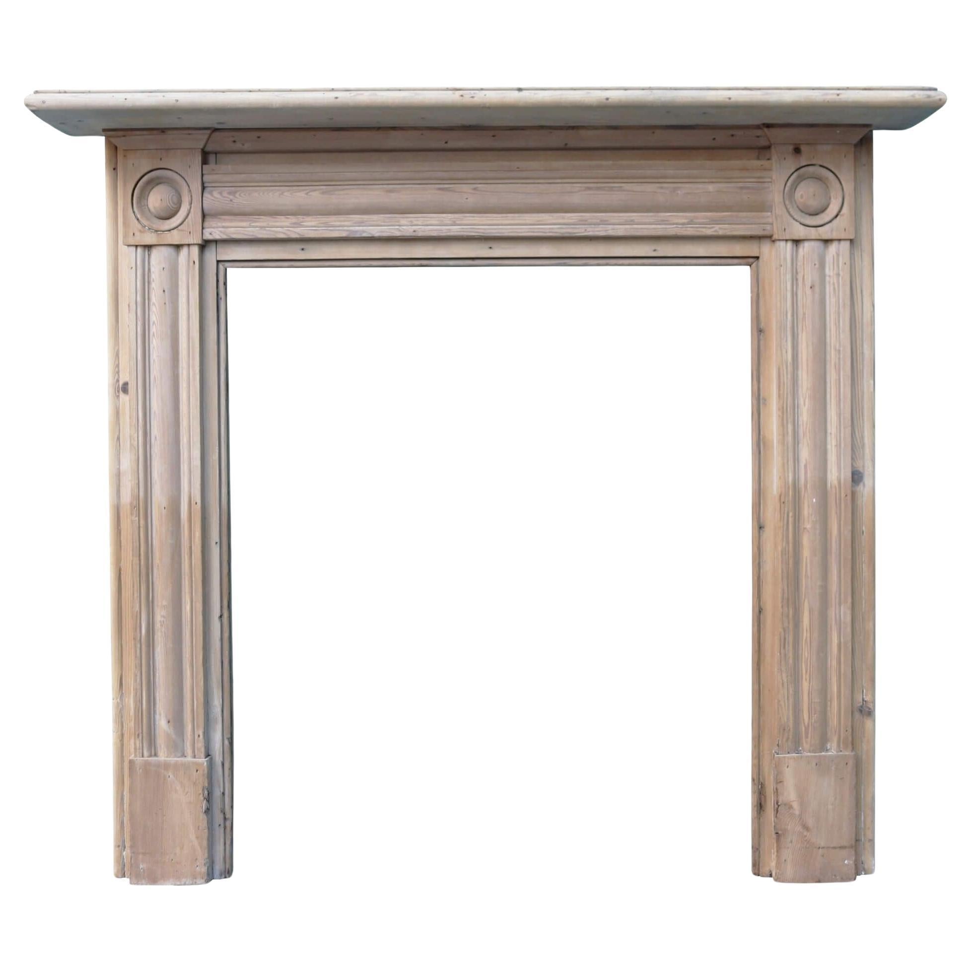 Stripped Pine Georgian Bullseye Fire Mantel For Sale