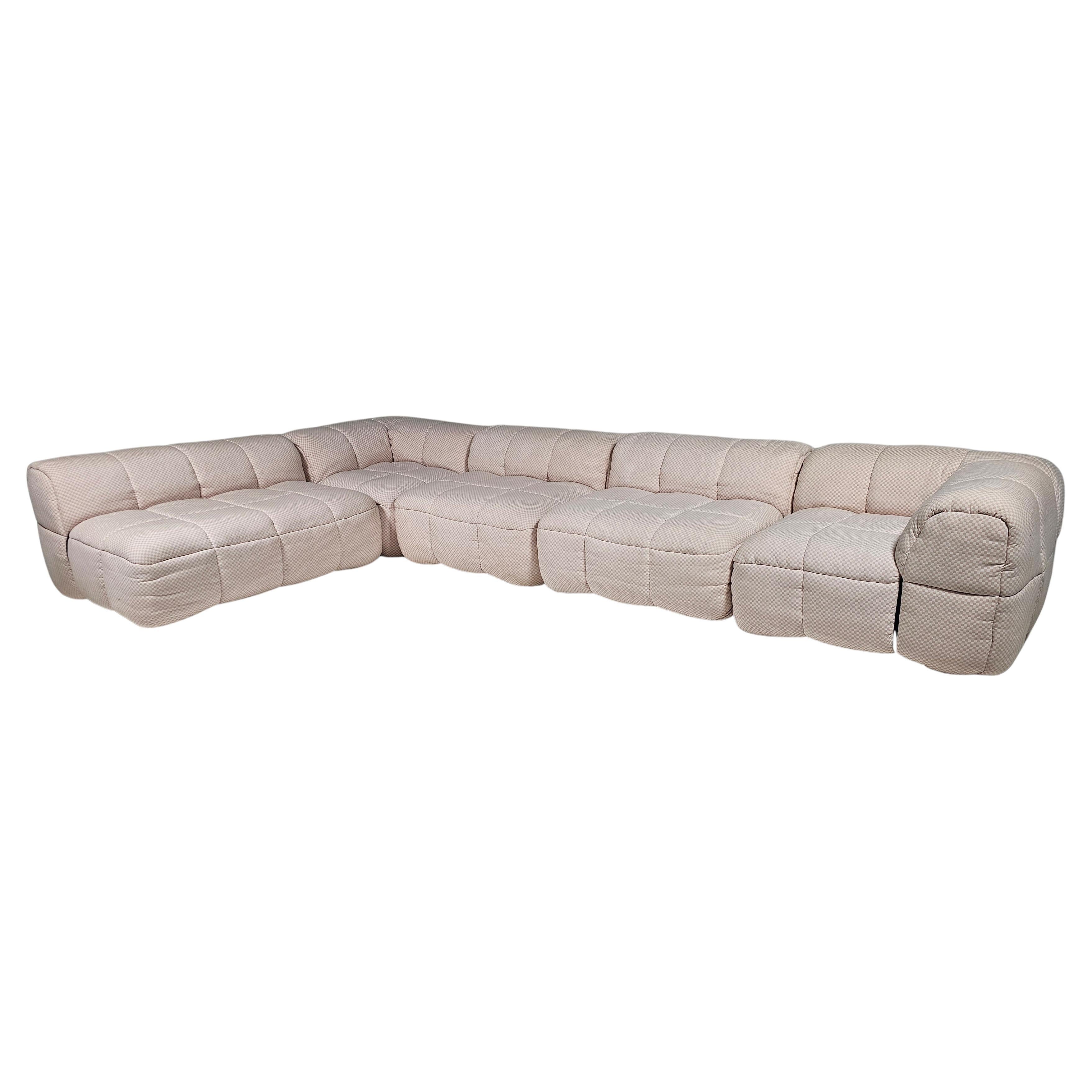 Strips sofa, Cini Boeri, original pink and cream checkered fabric, 1960s.

One of the most famous products of Arflex. Designed in 1968, it was awarded the price Compasso d’Oro and it is displayed in several museums around the world, like for example