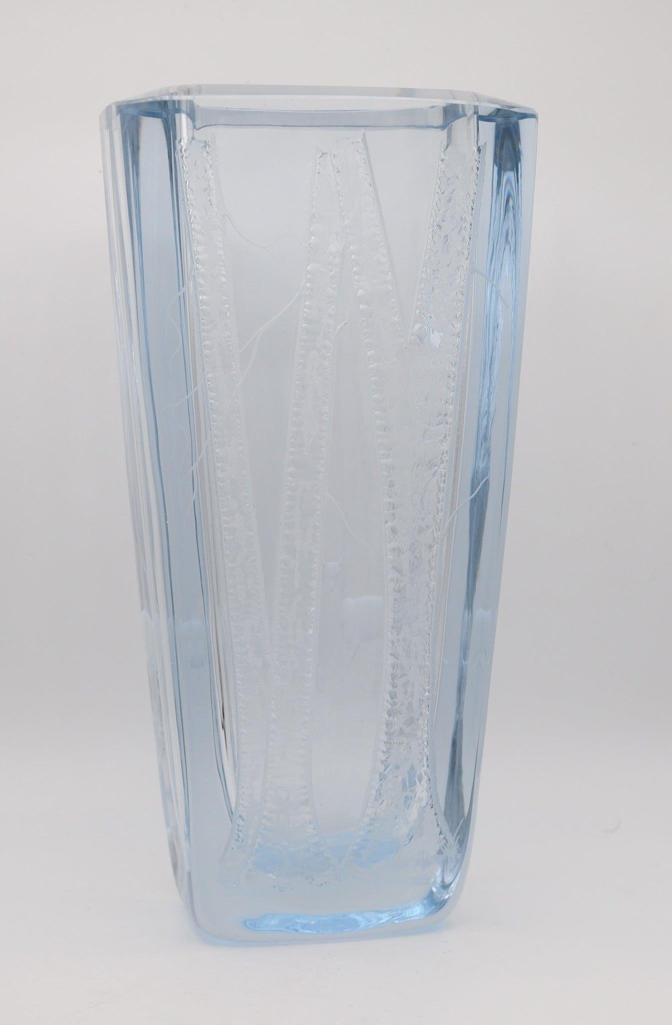 An art-glass vase designed by Laila Von Wendel for Strömbergshyttan .

This is a fabulous highly decorative glass vase created in Sweden by the art glass company of Strömbergshyttan, back in the 1960. The vase was designed by Rune Strand and