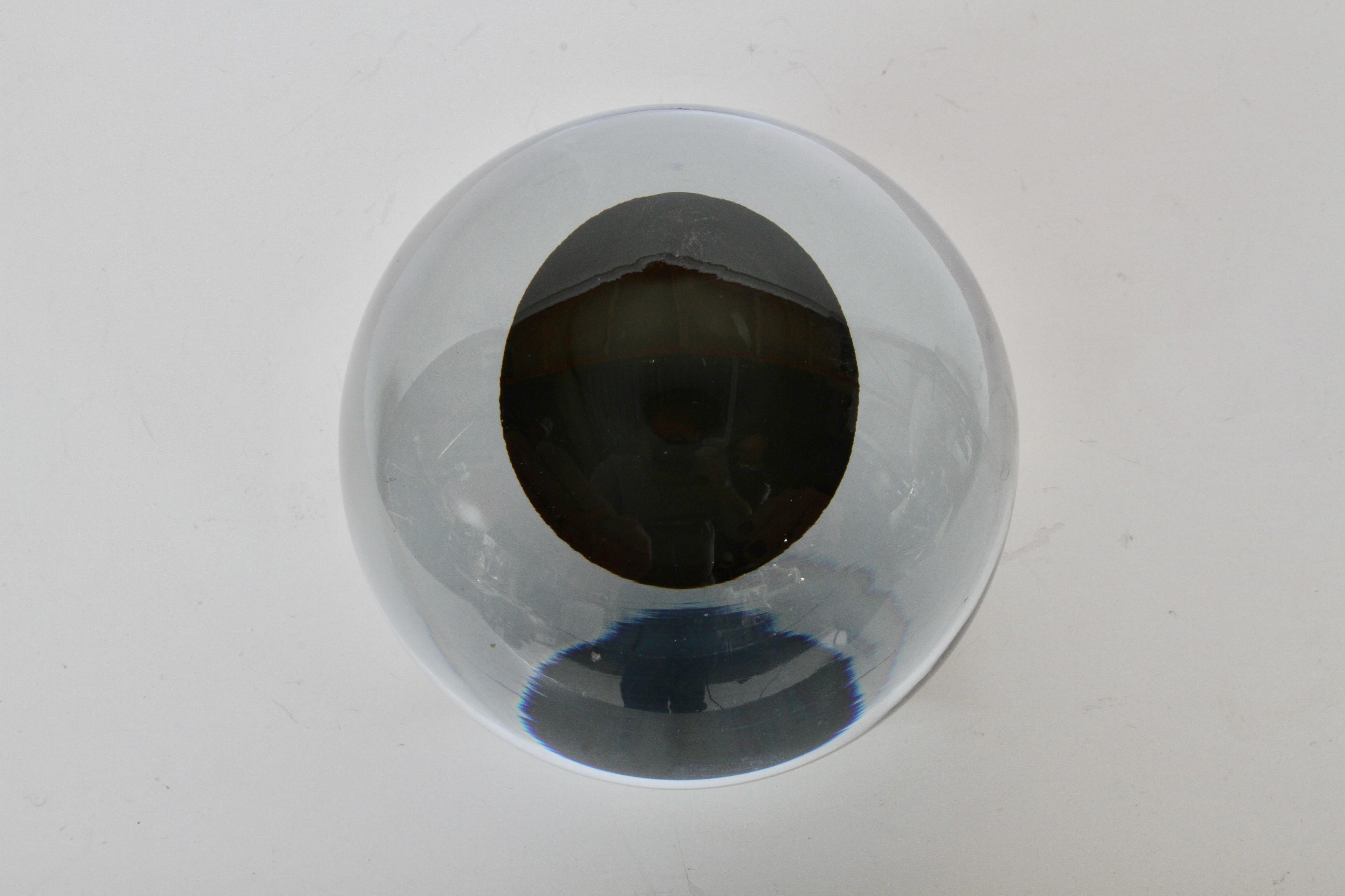 Strombergshyttan, Sweden Mid-Century Modern spherical glass orb paperweight, internally decorated with black glass 1960s. Light scratches. Signed Stromberg B 937.