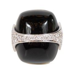 Vintage Strong and Bold 1970s La Triomphe Black Onyx Diamond Gold Ring
