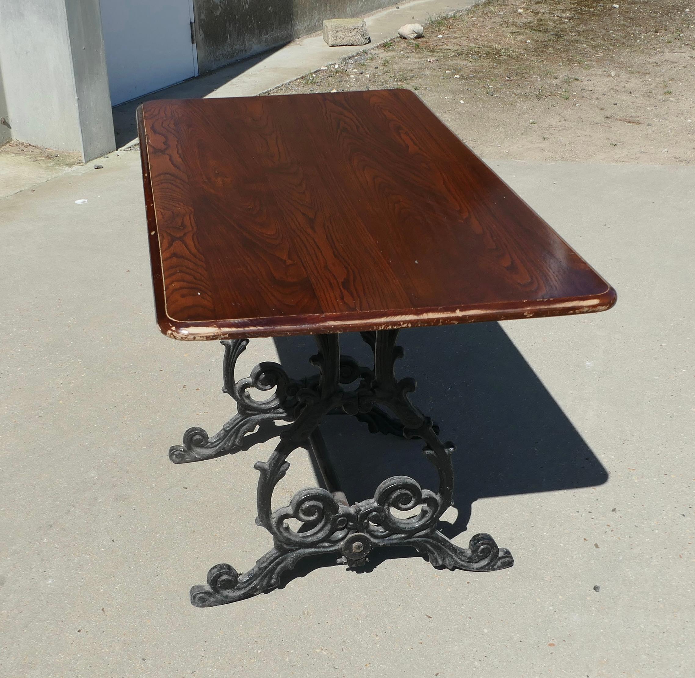 Early 20th Century Strong Attractive Cast Iron and Oak Garden Table For Sale