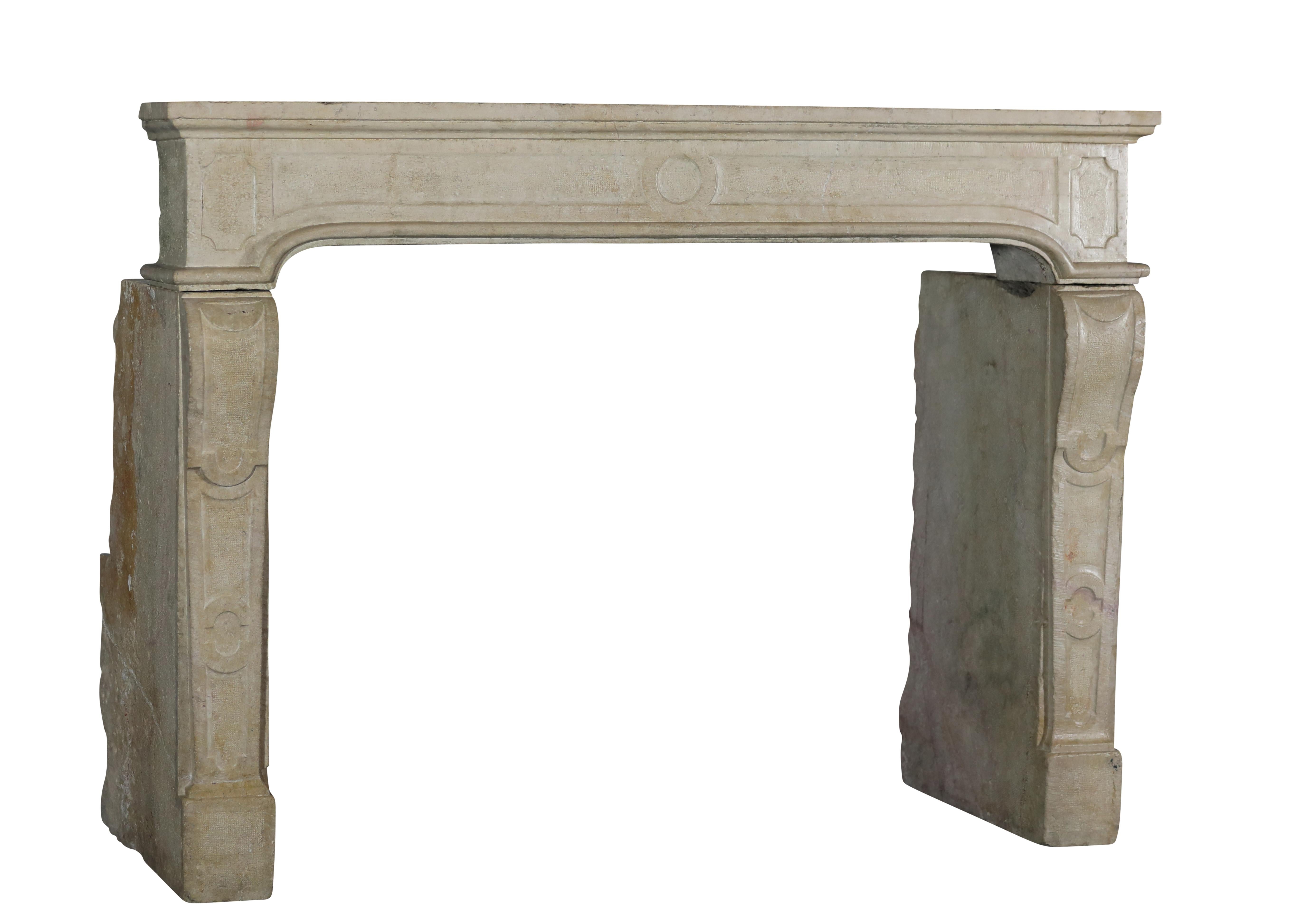 Strong French Beige hard limestone decorative fireplace.
Easy on the touch this French 18th century period fireplace reflects the light into the room.
A great mantle for great timeless fires.
This strong piece has some small restorations and is