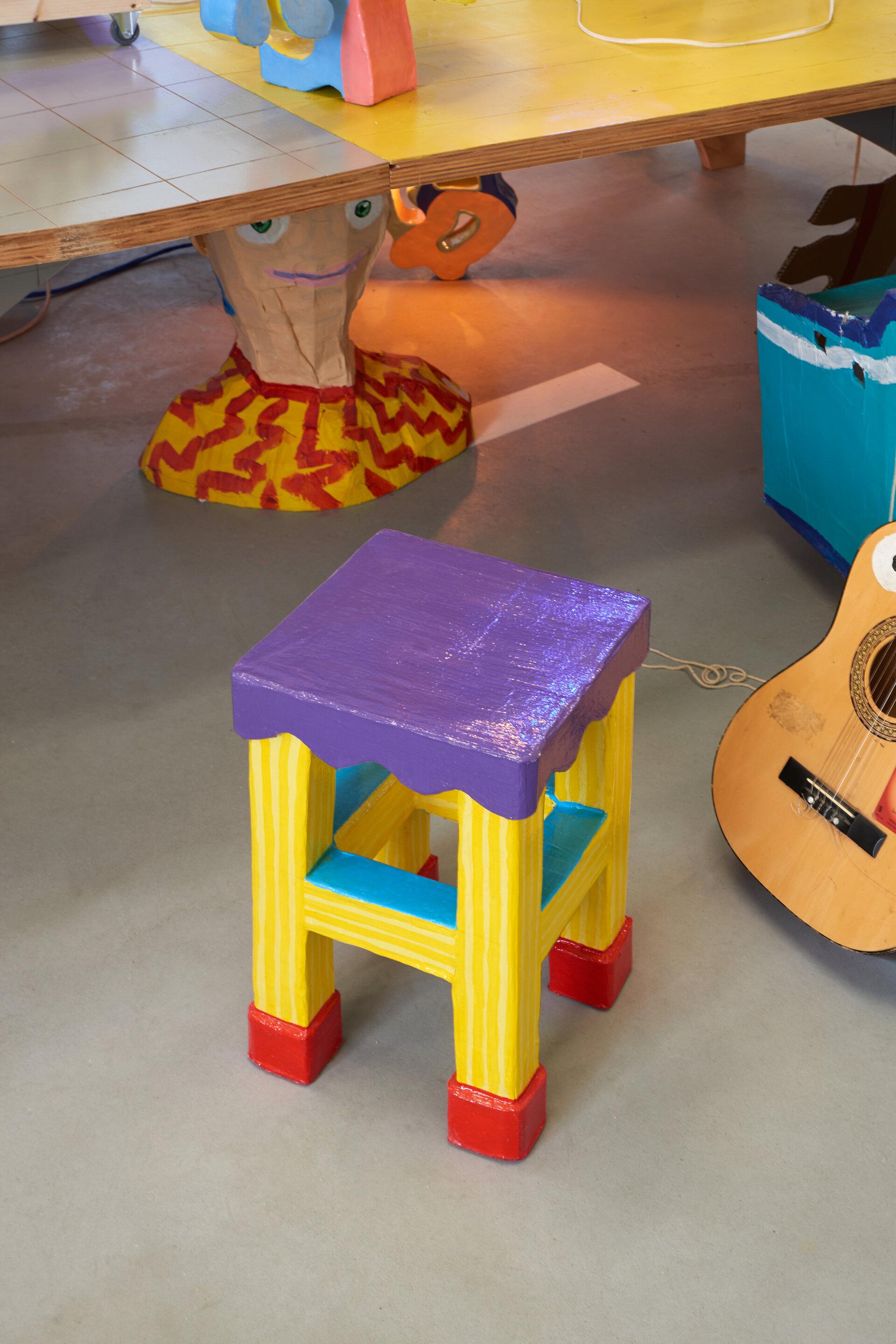If David Hockney designed furniture for a Mario game, the Strong Paper Stool would emerge in daily life, blurring the line between reality and virtuality. With its vibrant colors and cut-out shapes, this stool reinforces the notion of living in a