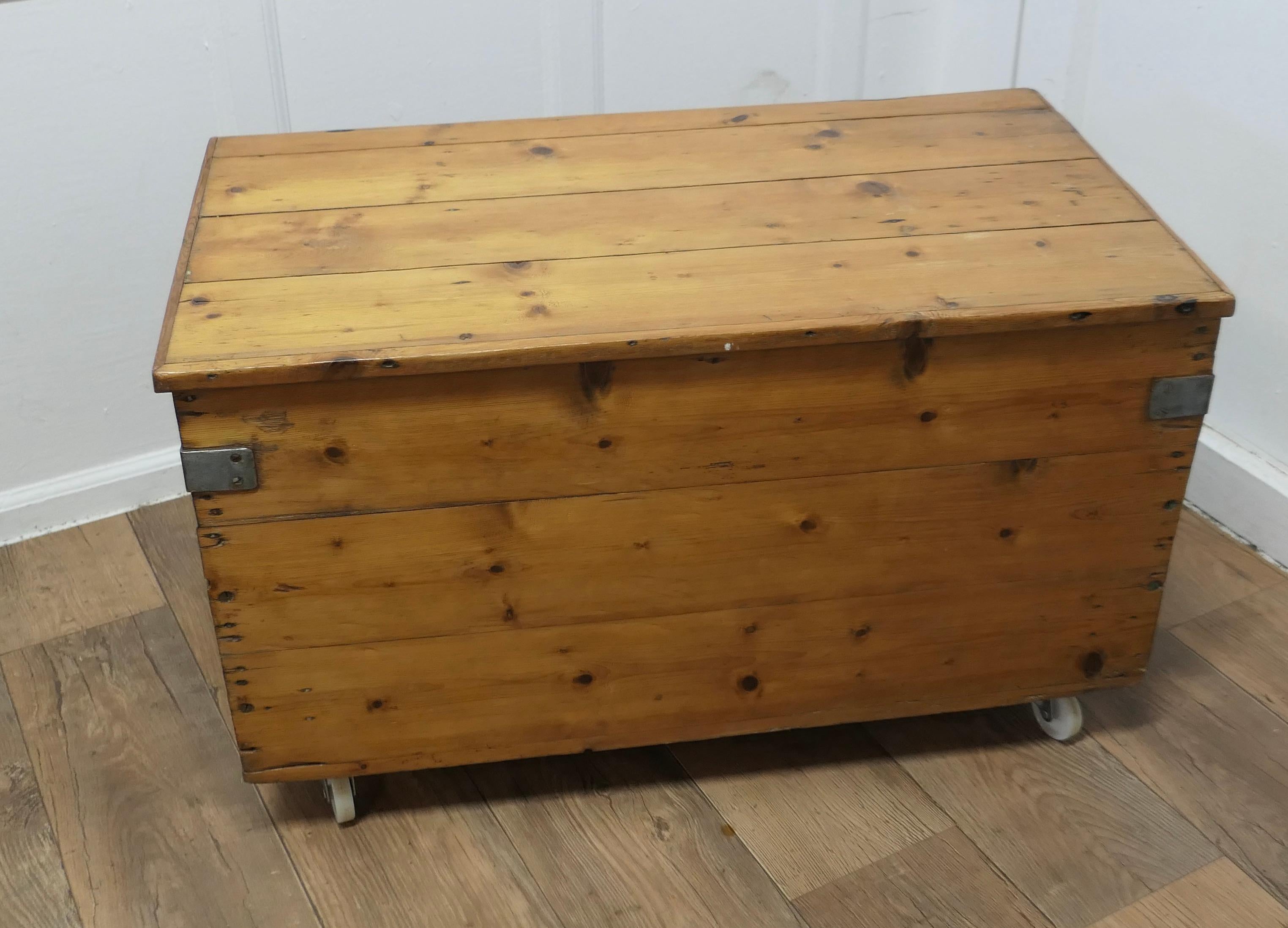 Strong Victorian Pine Blanket Box set on Wheels

This is a good heavy quality pine box it has been set on wheels making it easy to manoeuvre and it is a good height to be used as a coffee table
A good looking piece with a multitude of uses, clean