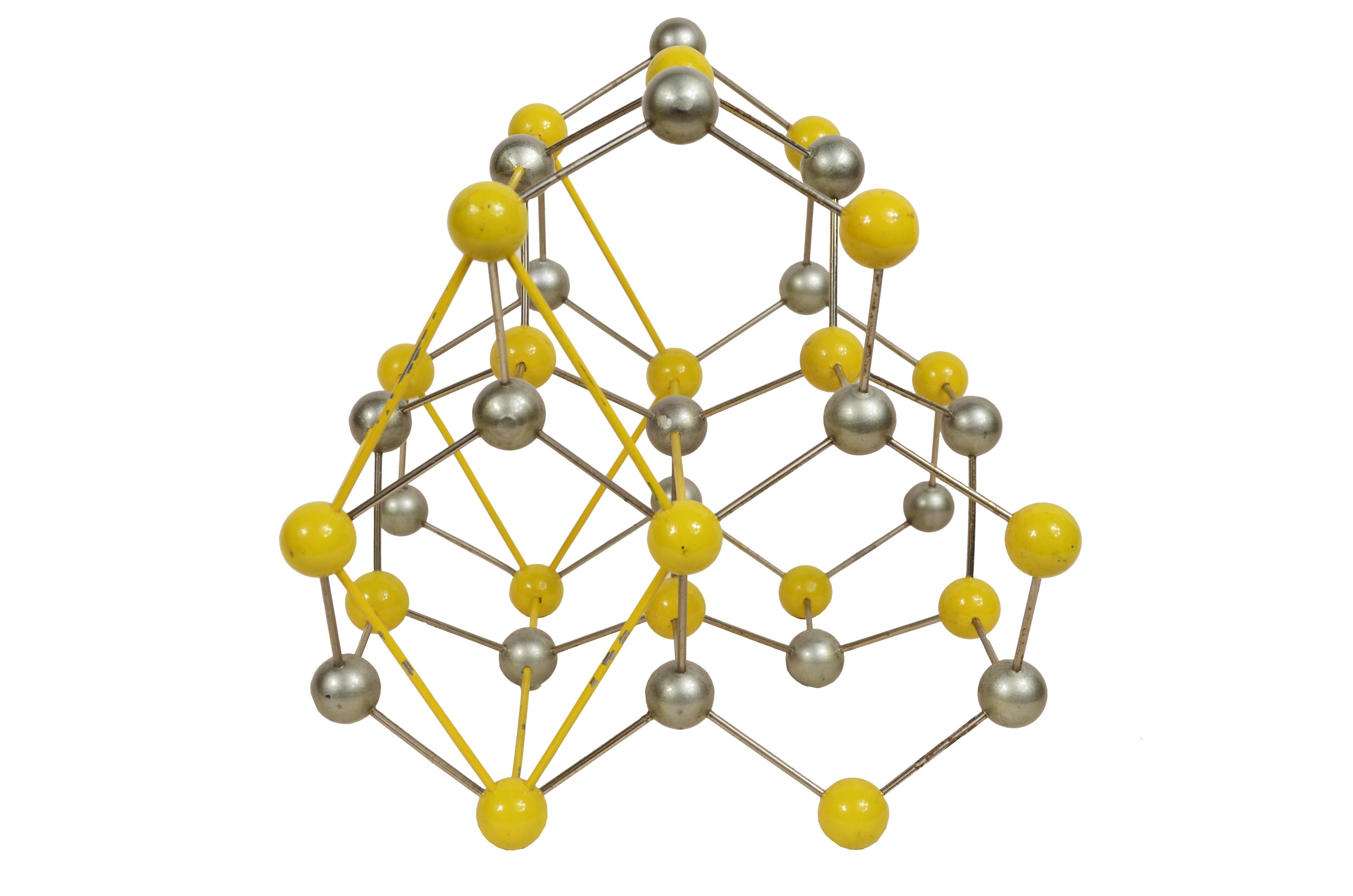 Atomic structure for educational use of zinc-iron sulfide, made of metal with Bakelite spheres painted gray and yellow. 
It is an inorganic compound found naturally in wurtzite, a mineral named after the French chemist Charles Wurtz.
It occurs as