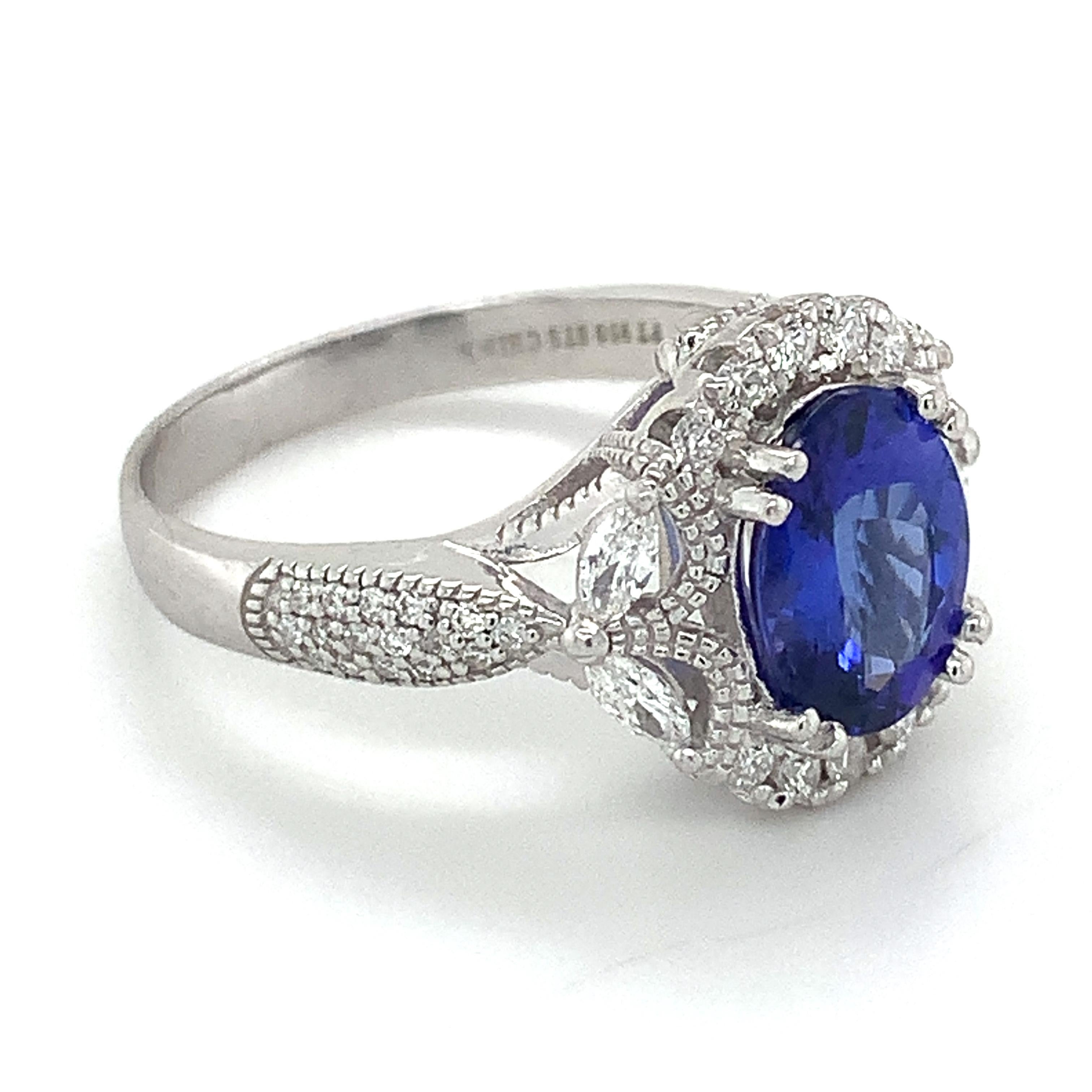 STS Platinum Oval Tanzanite W/ Marquise & Round Diamond Halo Ring Size 9.25 In Good Condition In Montgomery, AL