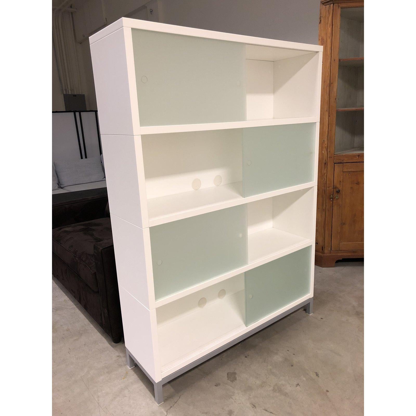 A Sapporo Shelving by STUA. Purchased in Design Within Reach.
Designed by Jesus Gasca in 1998, the Sapporo Shelving is finished on all sides in white lacquer, like Sapporo's snow in Japan. Minor wear, have been used. The doors are optional to place