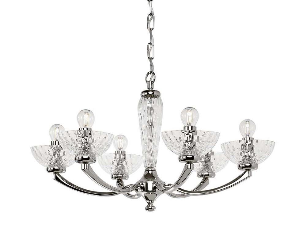 Modern and sophisticated, this chandelier effortlessly incorporates luxurious details with the clean lines of its silhouette. The metal structure displays an exquisite polished nickel finish that complements the balanced proportions of the six arms