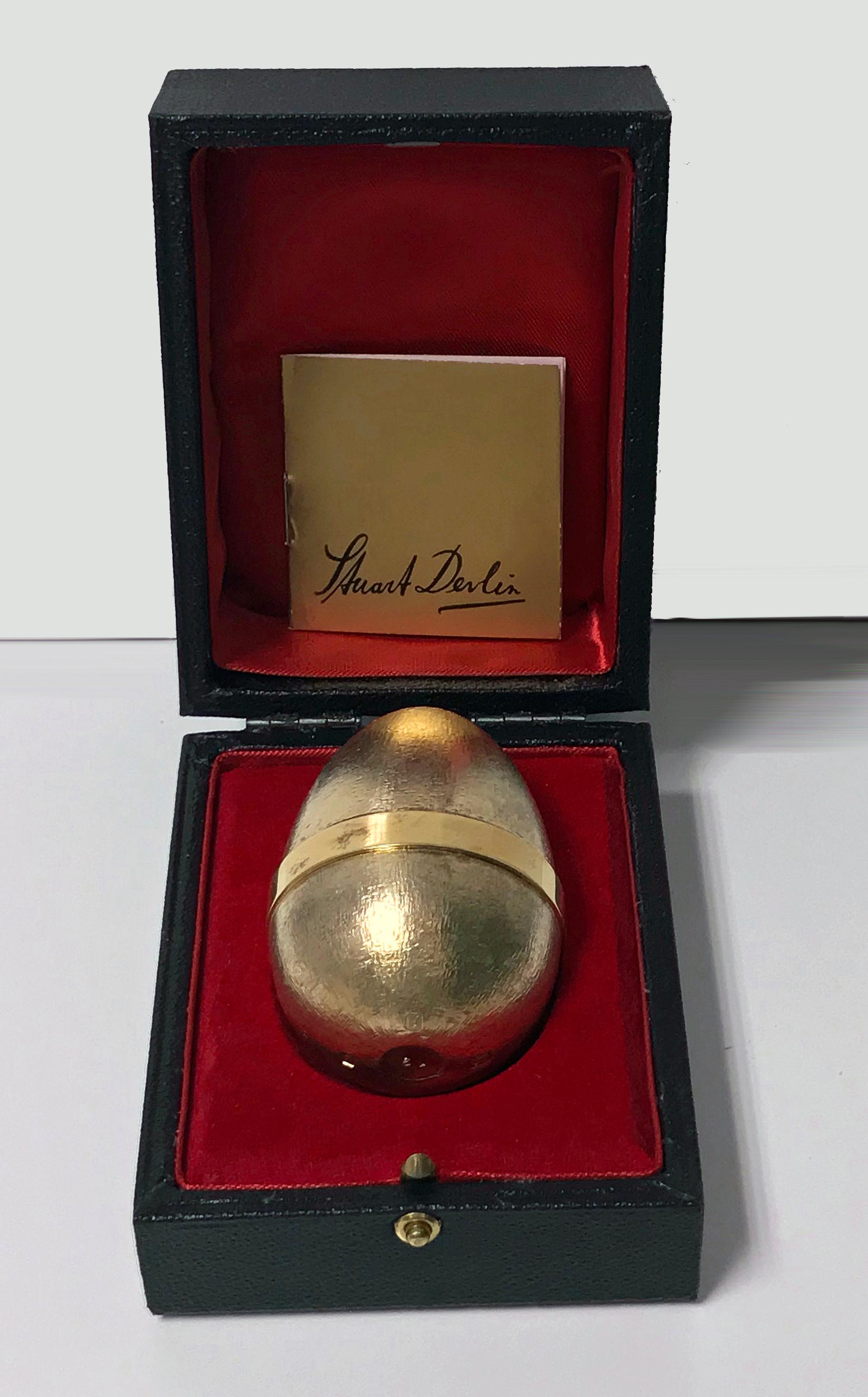 Stuart Devlin Silver Gilt Surprise Egg, London 1984, opening to reveal Swan or Duck family among reeds. Original box and papers. Height: 7.5cm high, No 19 of limited edition of 100. Item Weight: 135 grams.