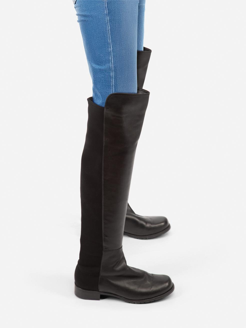 CONDITION is Very good. Minimal wear to the boots is evident. Abrasion across all leather areas and heel on both shoes on this used Stuart Weitzman designer resale item.
 
 Details
 
 
 Model: 5050
 
 Black
 
 Leather
 
 Over the knee
 
 Block heel
