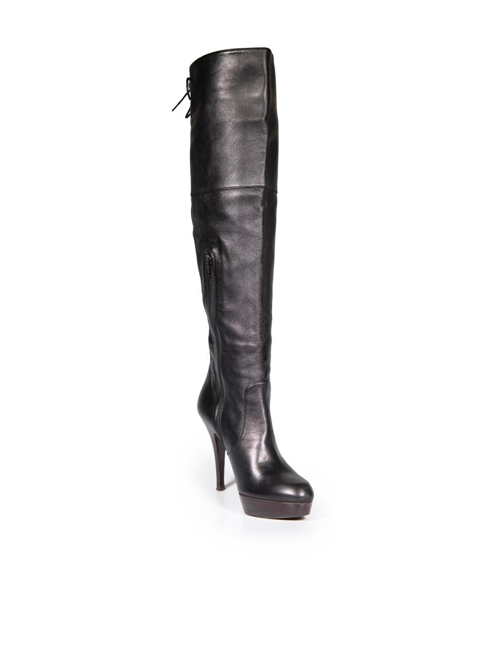 CONDITION is Very good. Minimal wear to boots is evident. Minimal wear to both boot heels and toes, as well as the right-side of the right boot with scratches and abrasions on this used Stuart Weitzman designer resale item. These boots come with