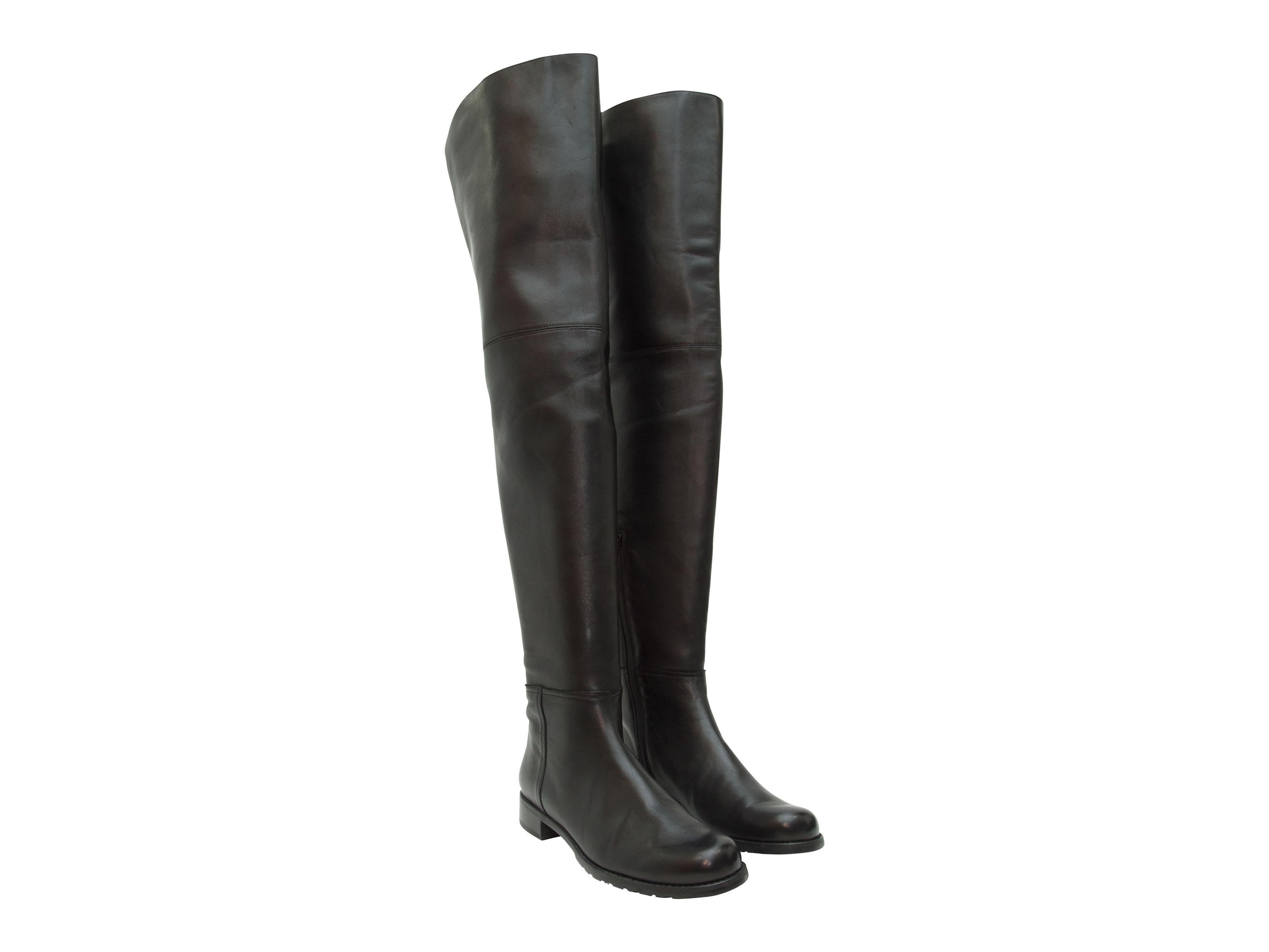 Product details:  Black leather thigh-high boots by Stuart Weitzman.  Round toe.  Low stacked heel.  Pull-on style.  1.25