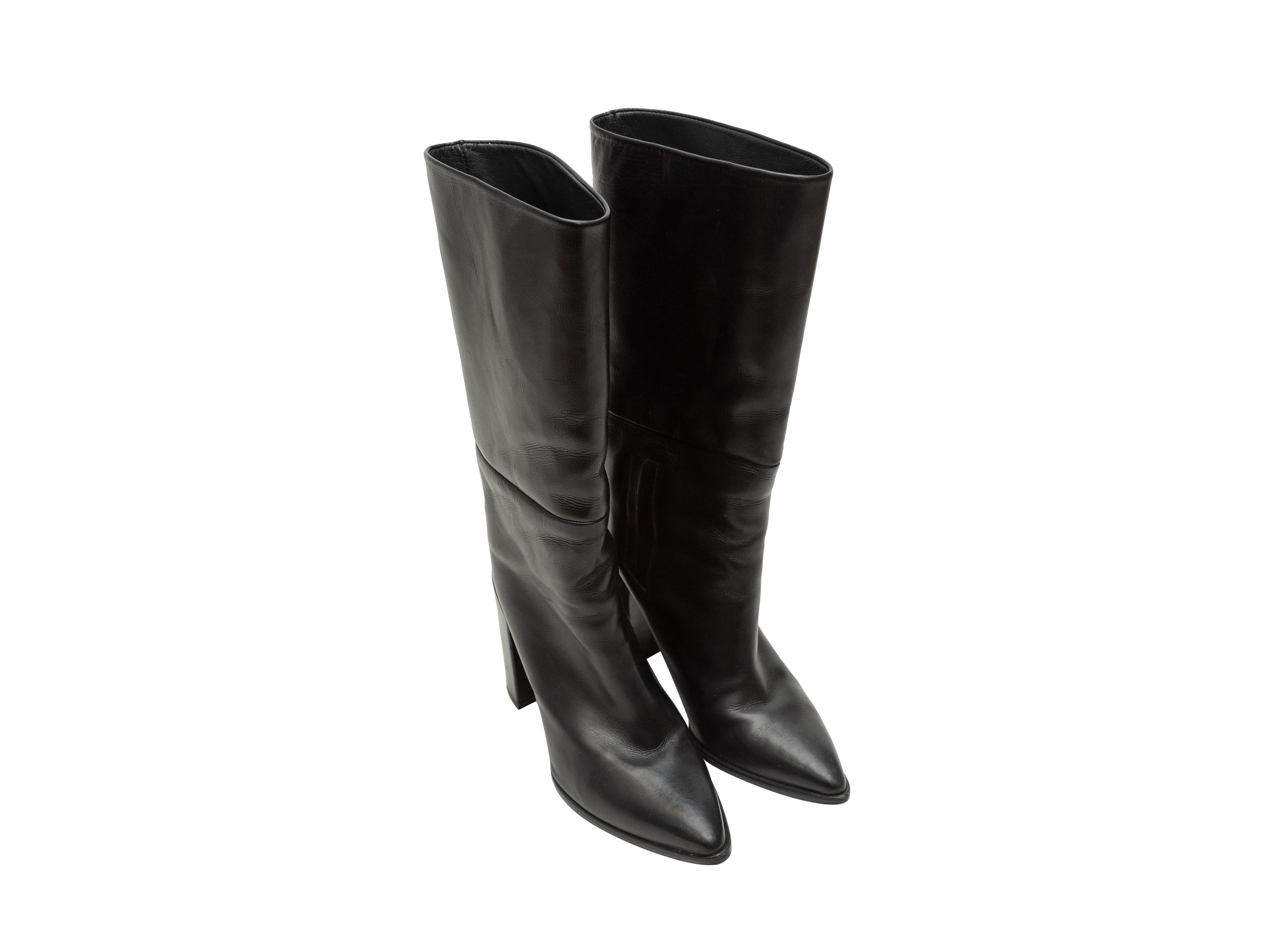 Product details: Black leather mid-calf pointed-toe boots by Stuart Weitzman. Block heels. 4