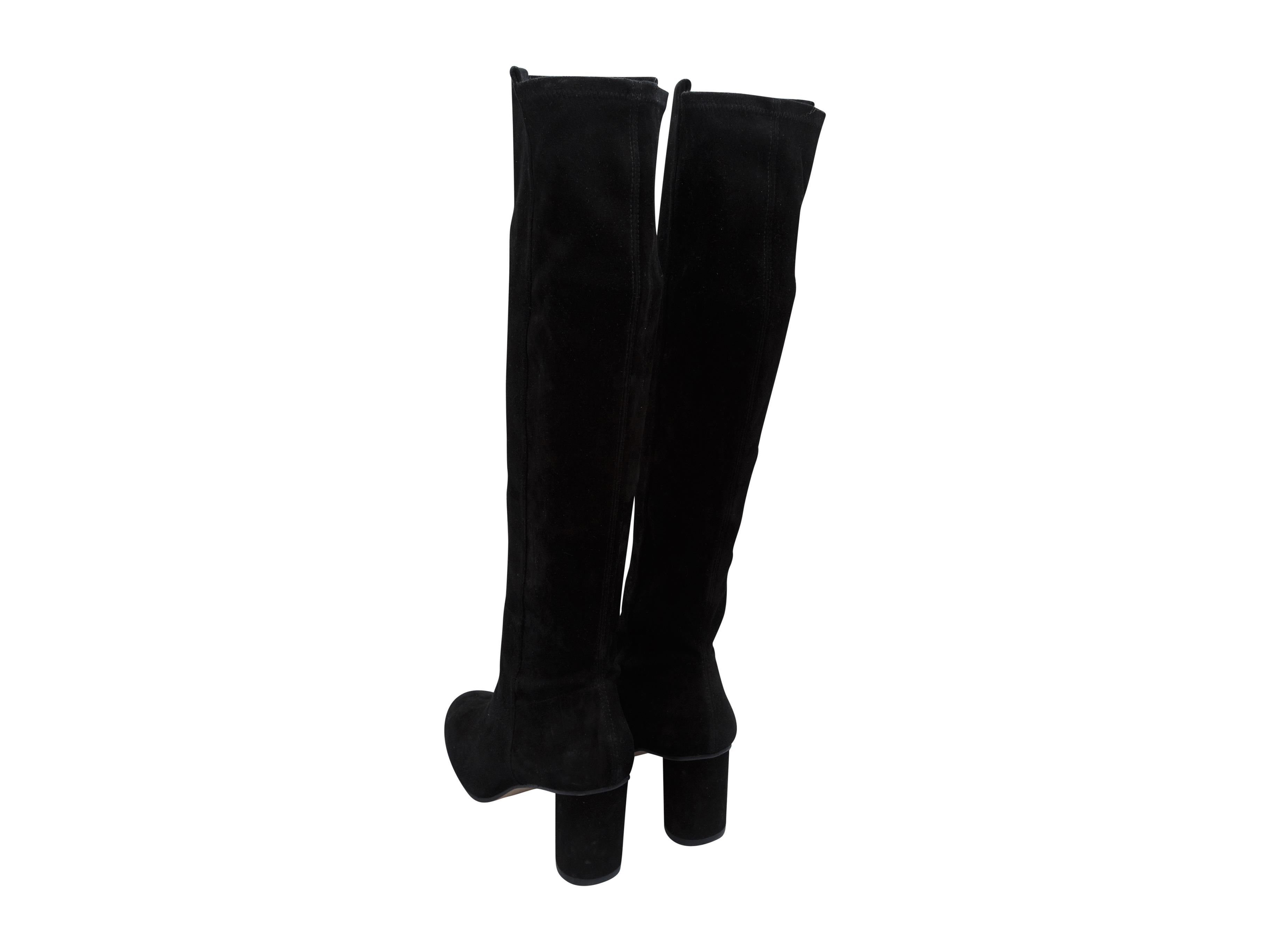 Product details: Black suede knee-high boots by Stuart Weitzman. Round-toes. Block heels.
Condition: Pre-owned. Very good.
Est. Retail $ 600.00