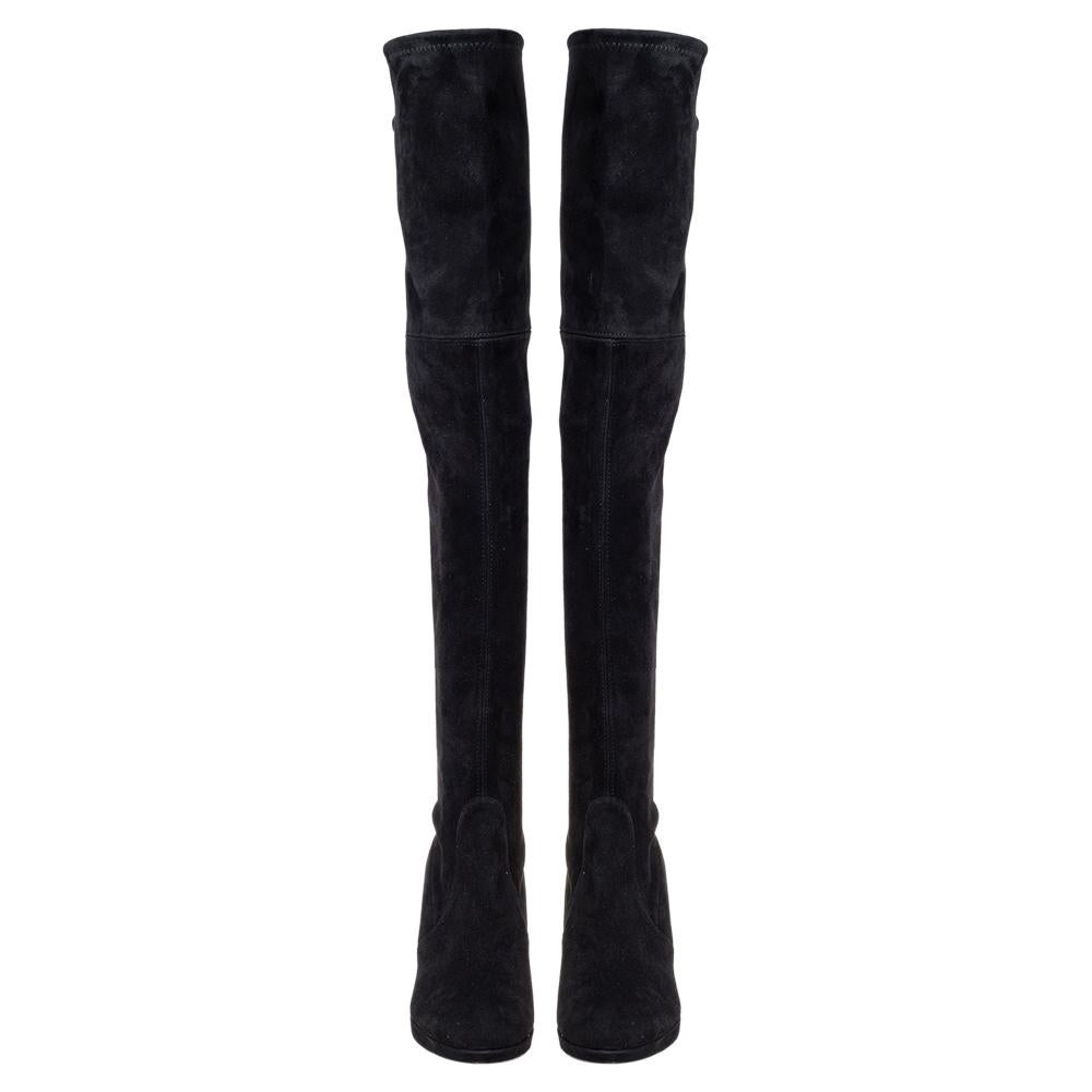 Wear it with the most minimal outfit and these stunning Stuart Weitzman over-the-knee boots will stand out and speak for themselves. Constructed in black suede, these super flattering boots feature 7 cm heels giving you both height and comfort along