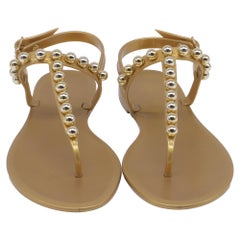 Stuart Weitzman Goldie Jelly Sandals in Gold PVC