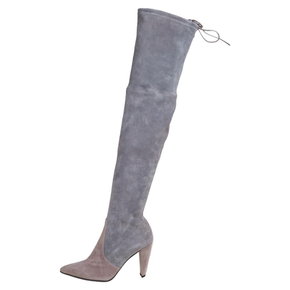 If you're looking to add a pair of thigh-high boots to your collection, it should be from Stuart Weitzman! The grey Highland boots are crafted from suede into a chic silhouette. They flaunt pointed toes, comfortable leather-lined insoles, self