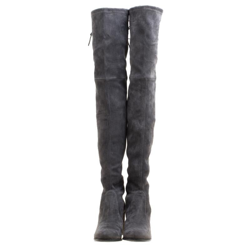 Get set to dazzle wherever you go with these over the knee boots from Stuart Weitzman. The grey boots are crafted from suede and feature a chic silhouette. They flaunt round toes, comfortable leather lined insoles, a self-tie up detailing at the