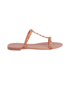 Sandalias «Jelly» de Stuart Weitzman con perla, de goma rosa melocotón