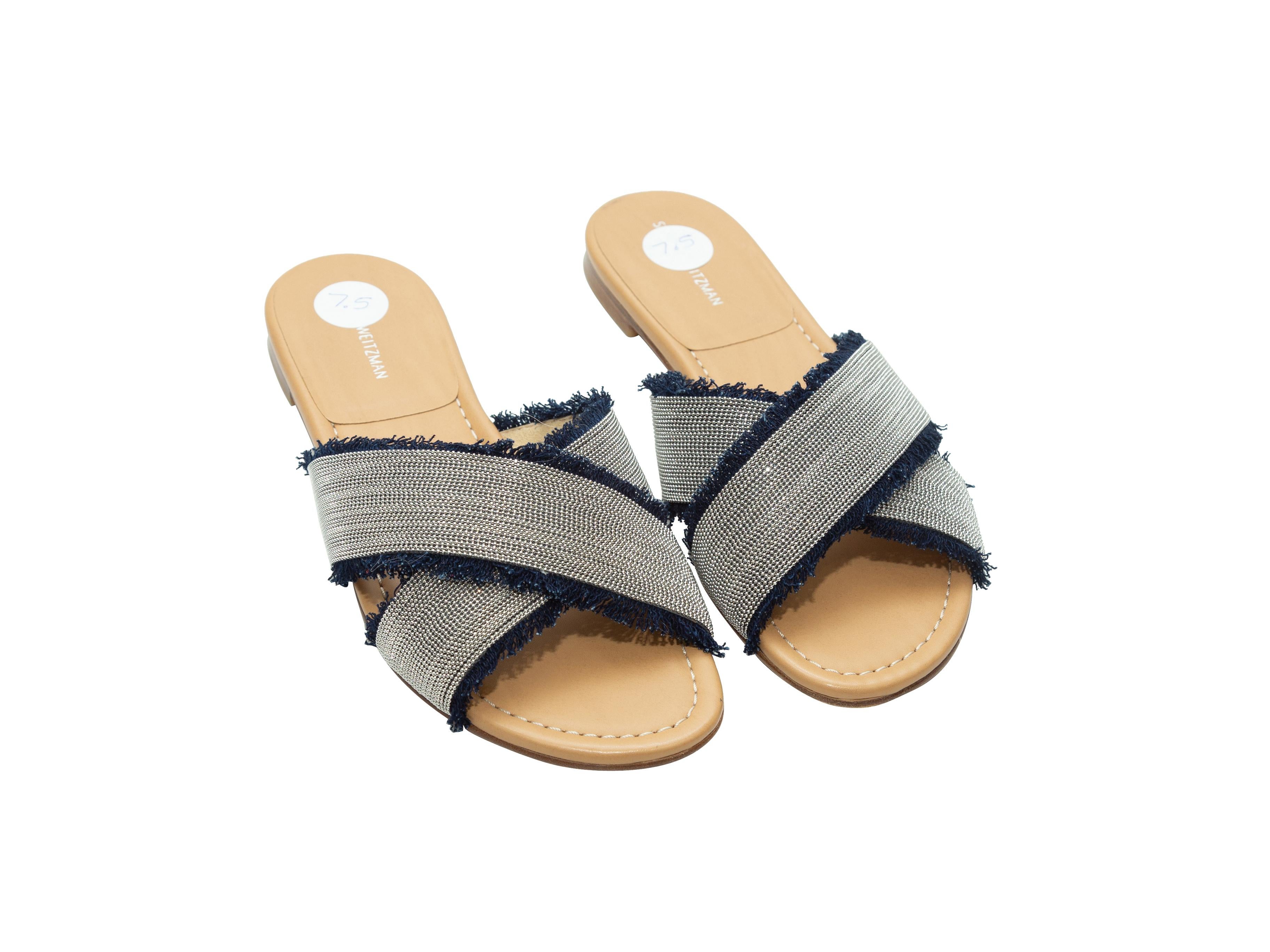 Product details: Navy and silver-tone slide sandals by Stuart Weitzman. Beading throughout. Fringe trim.
Condition: Pre-owned. Very good. Light wear at soles.
Est. Retail $ 430.00