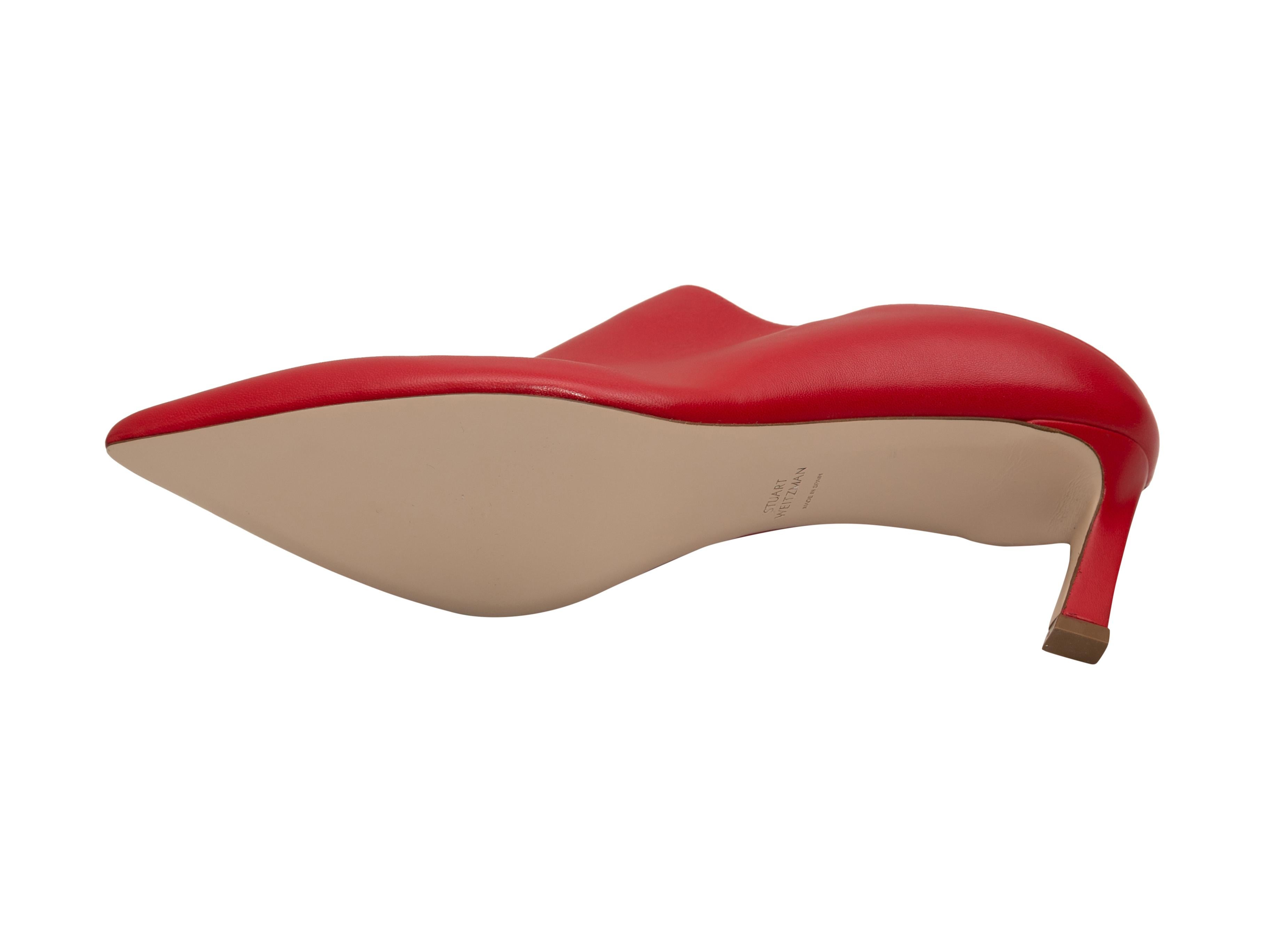 Product details: Red leather pointed-toe mules by Stuart Weitzman. 2.5