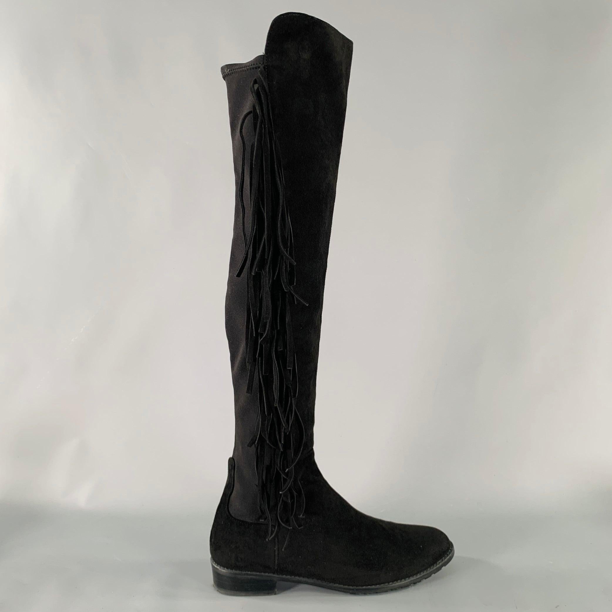 STUART WEITZMAN boots
in a
black suede with stretchy nylon panel featuring a knee high style, fringe design, and pull on closure. Comes with dust bag. Made in Spainches Very Good Pre-Owned Condition. Minor signs of wear. 

Marked:   SW 997232 7.5 M