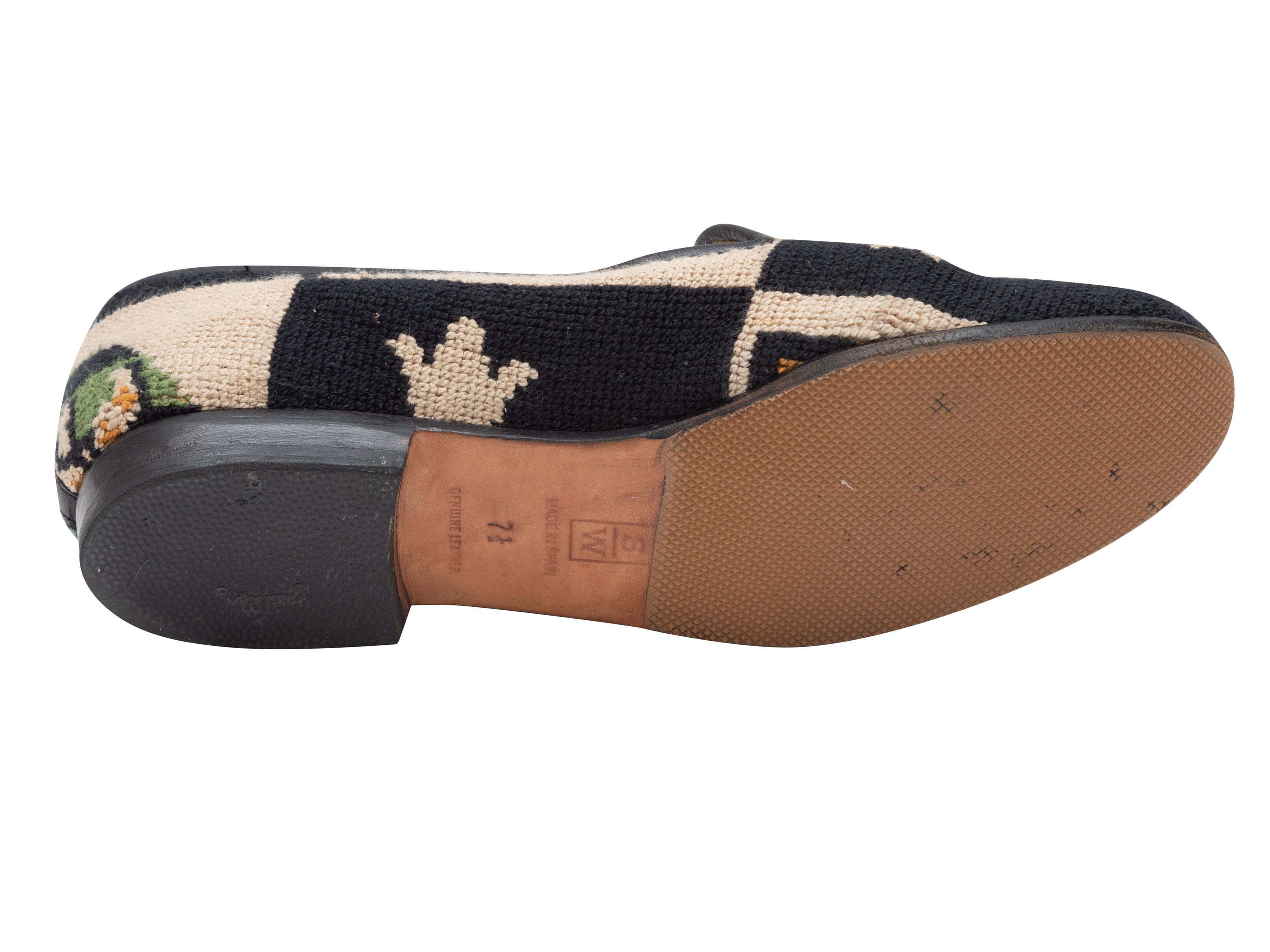 Product Details: Black and multicolor patterned needlepoint loafers by Stubbs & Wootton. Leather trim throughout. 0.75