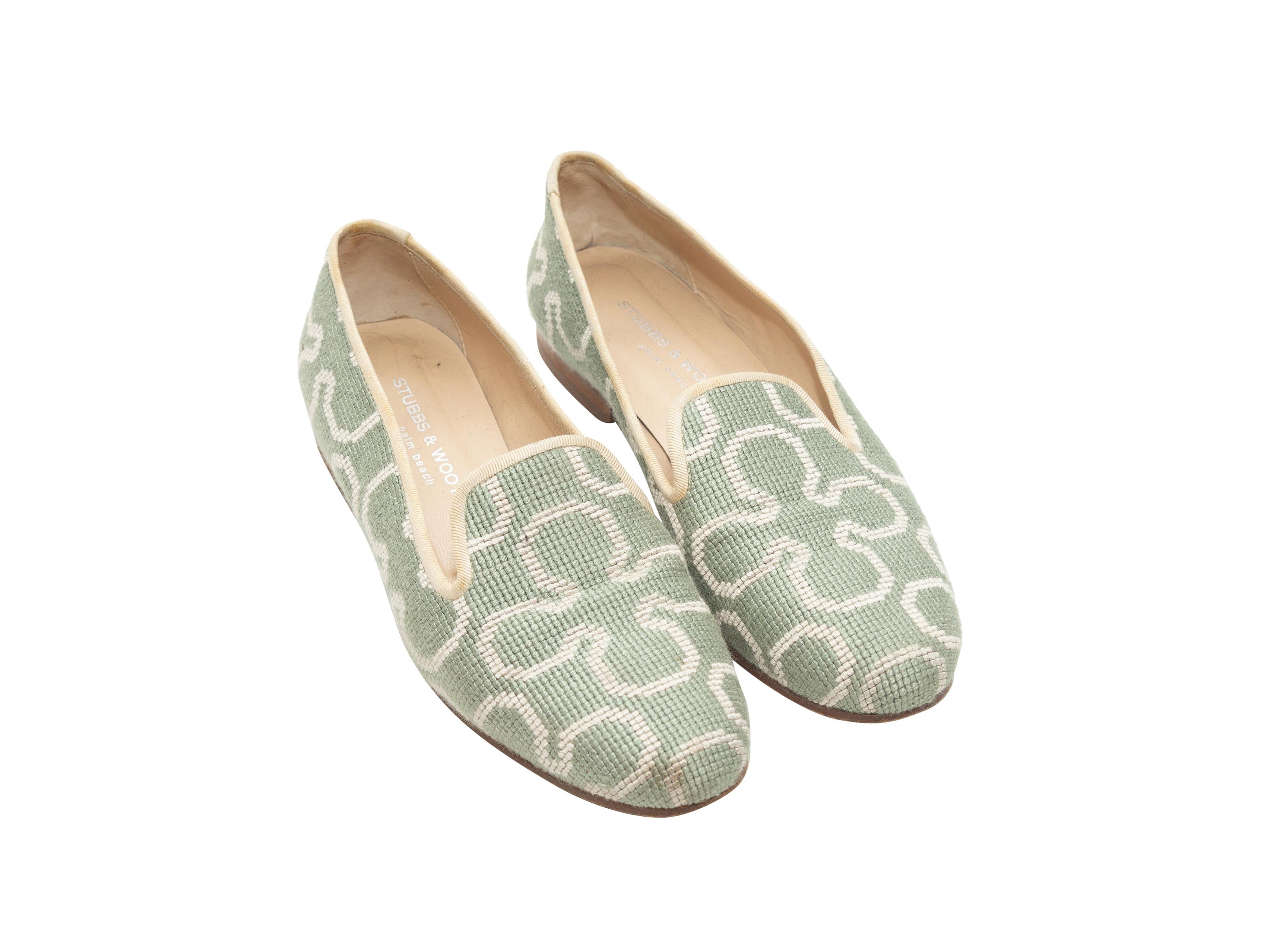 Product details: Sage green and beige round-toe loafers by Stubbs & Wootton. Grosgrain trim. Needlepoint pattern throughout. 0.75